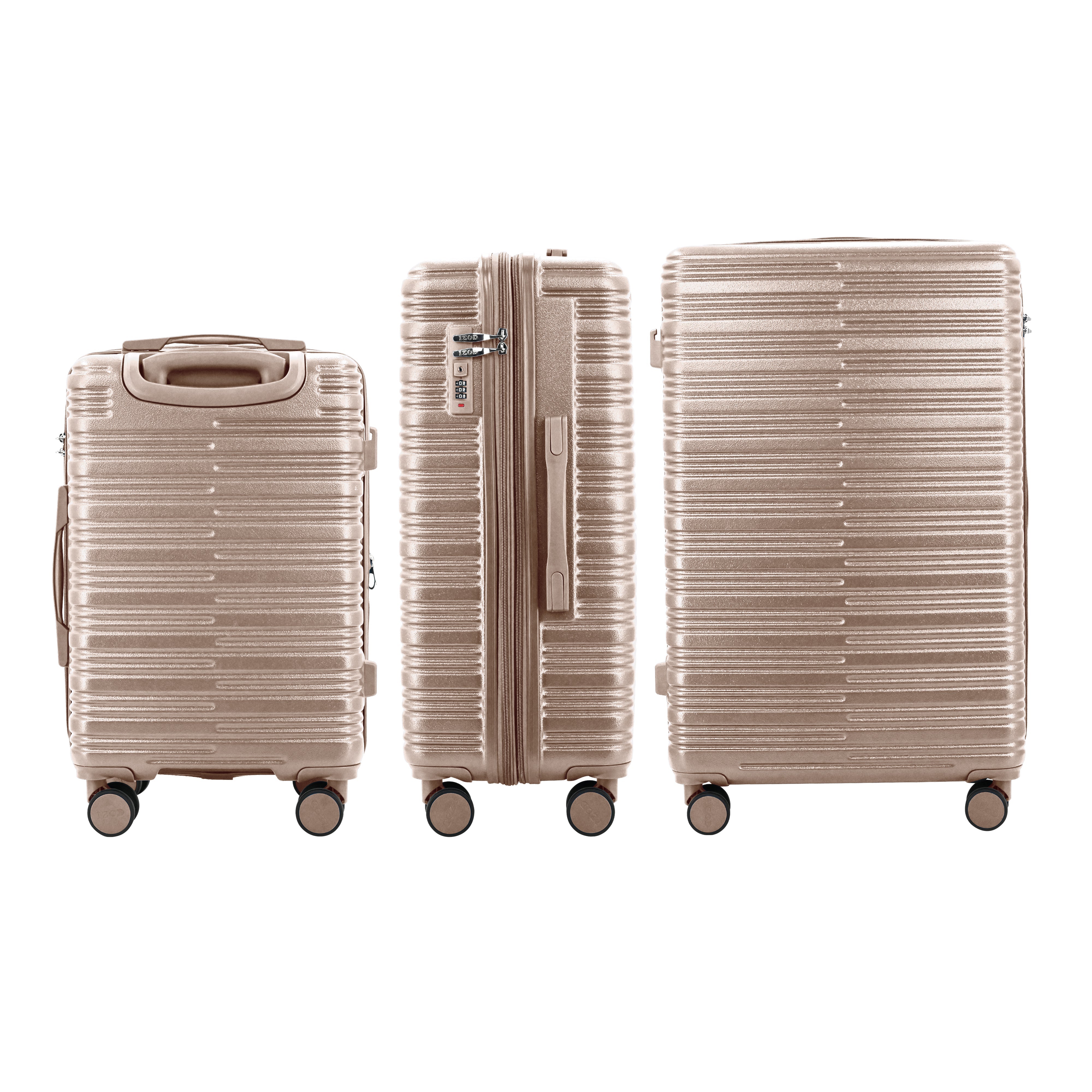 Set of three beige suitcases of different sizes on a white background