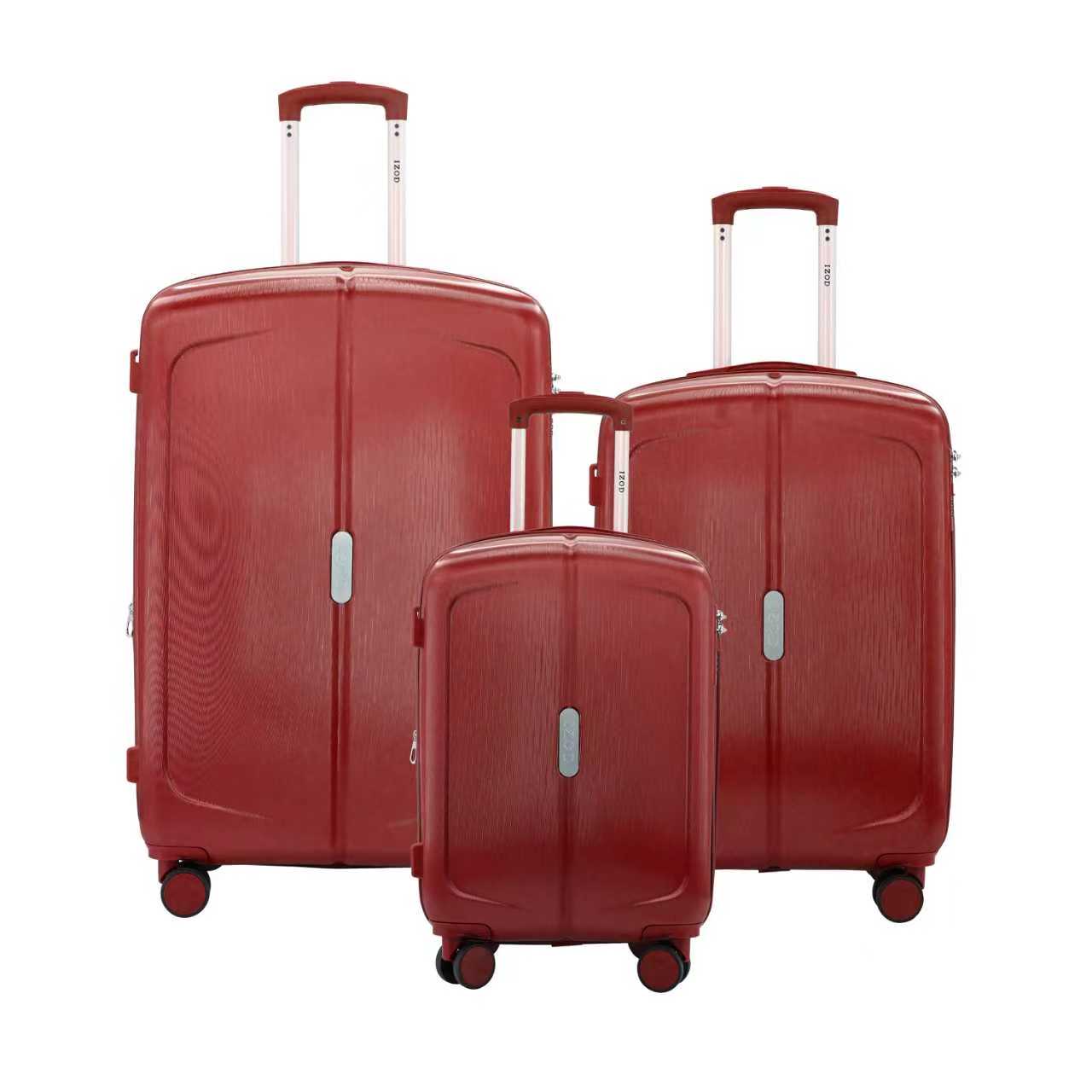 Three red suitcases of different sizes on a white background