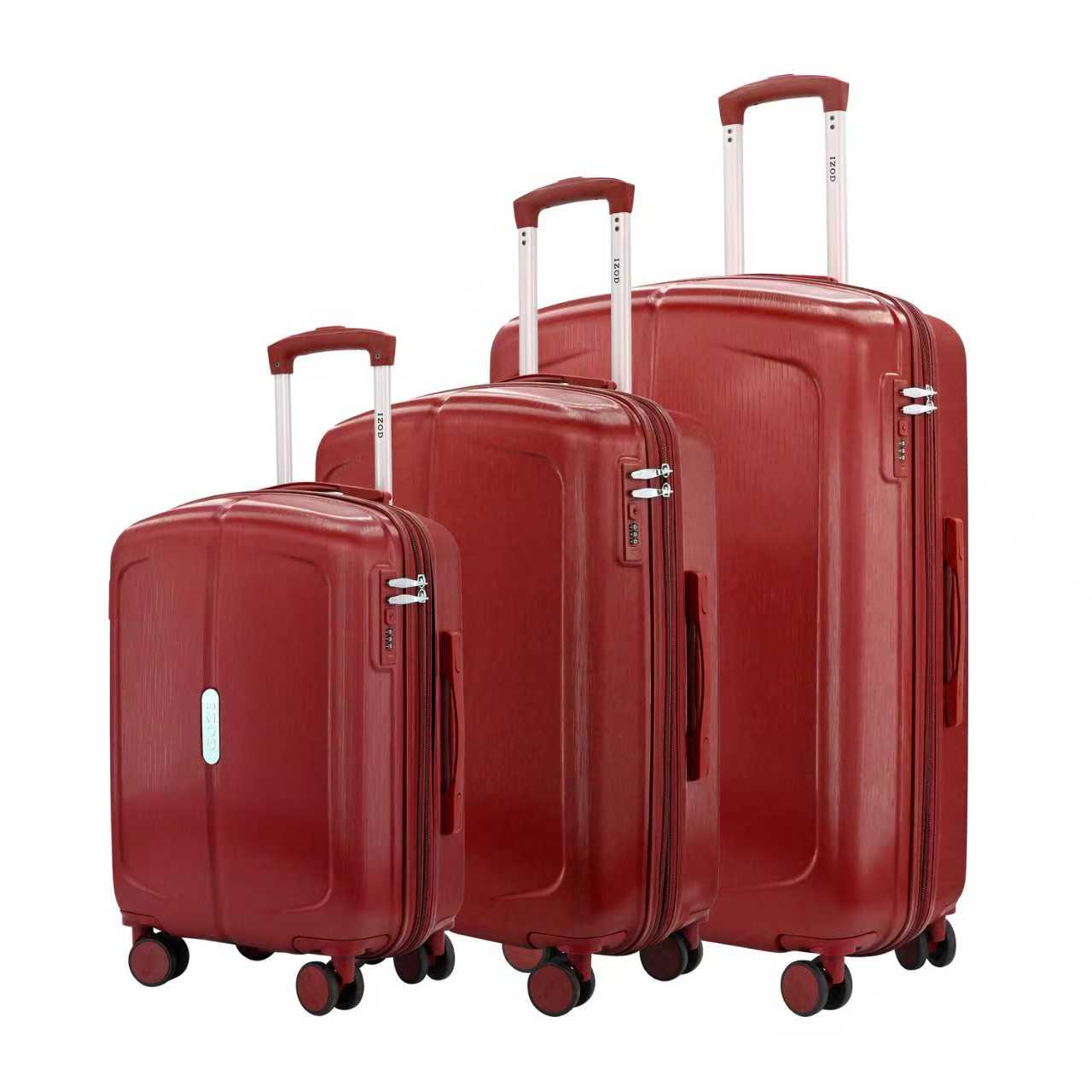 Set of three red suitcases of different sizes on a white background