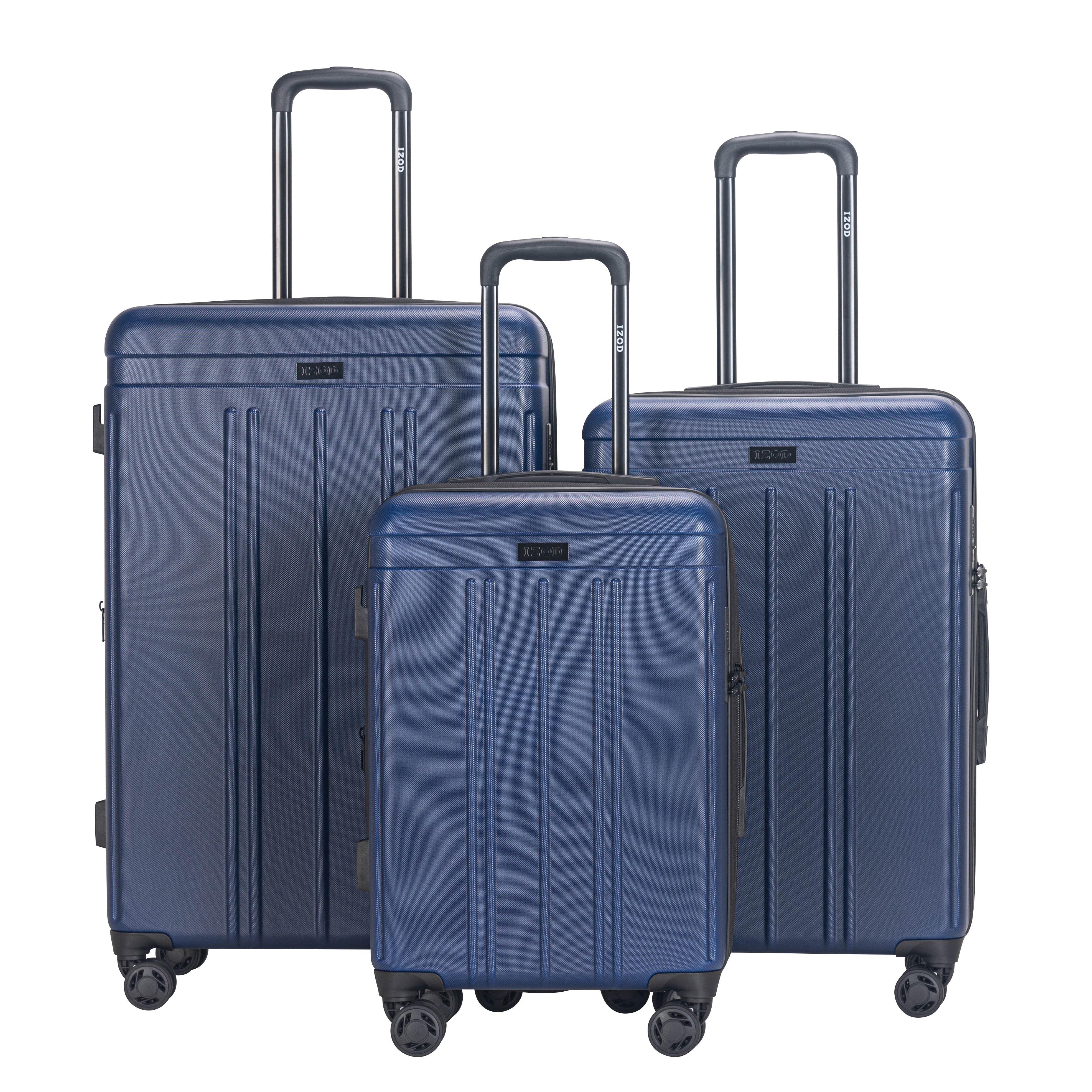 Set of three blue suitcases of different sizes on a white background