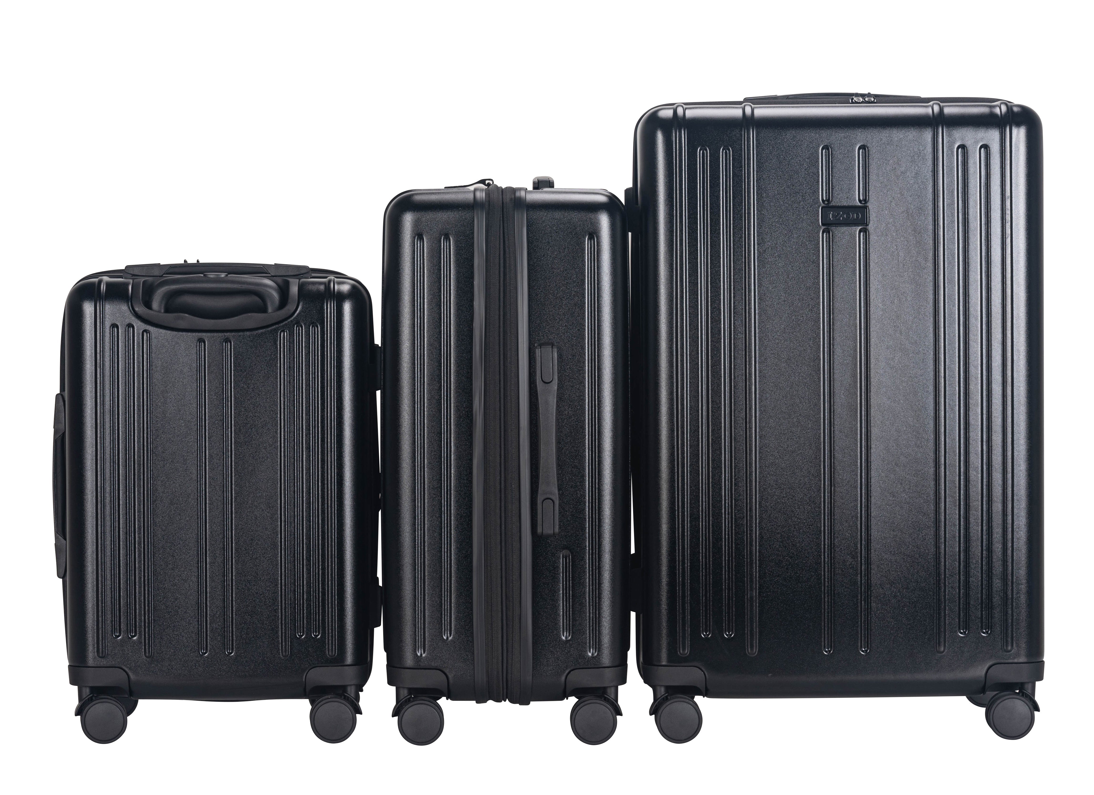 Three black suitcases of different sizes on a white background