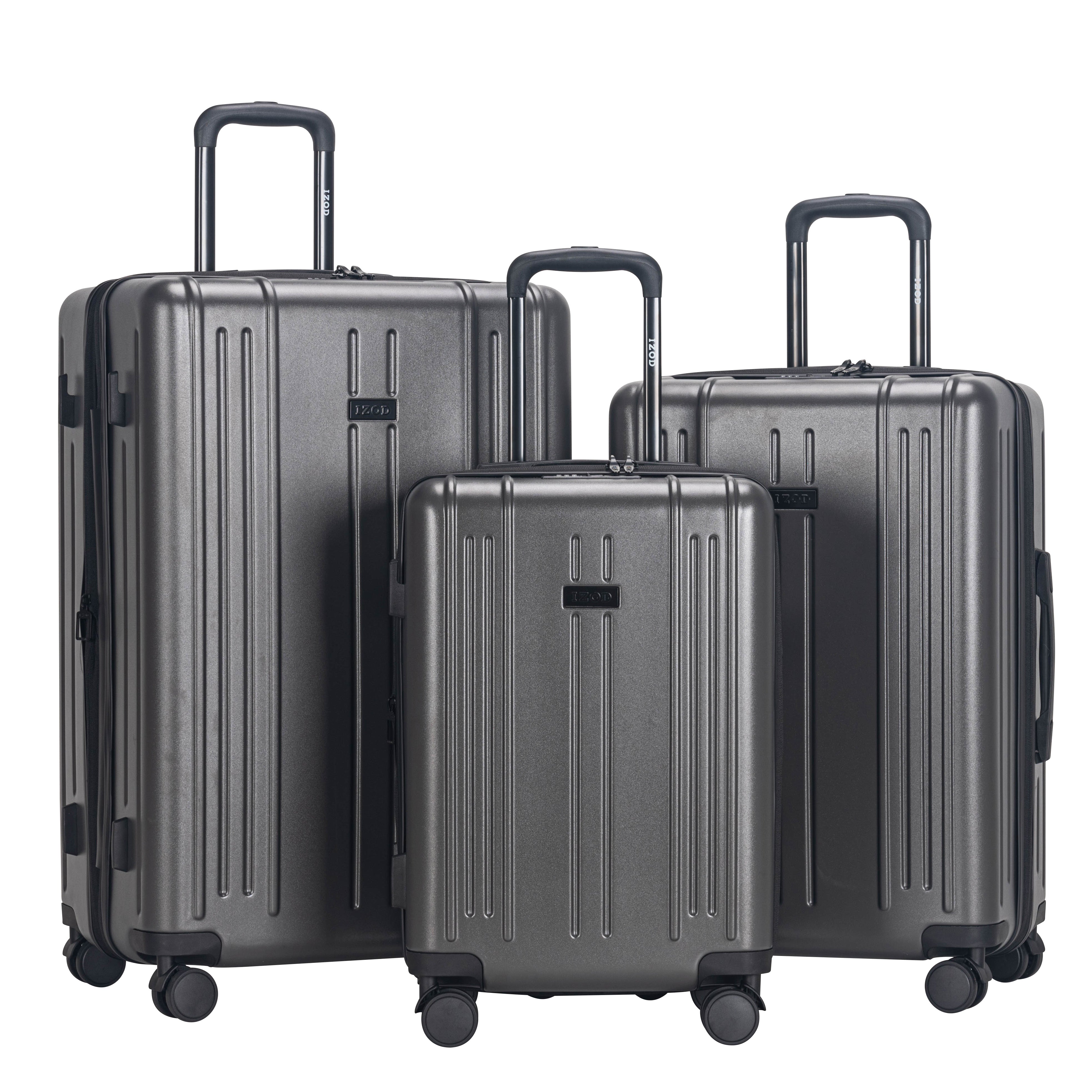 Three silver suitcases of different sizes on a white background