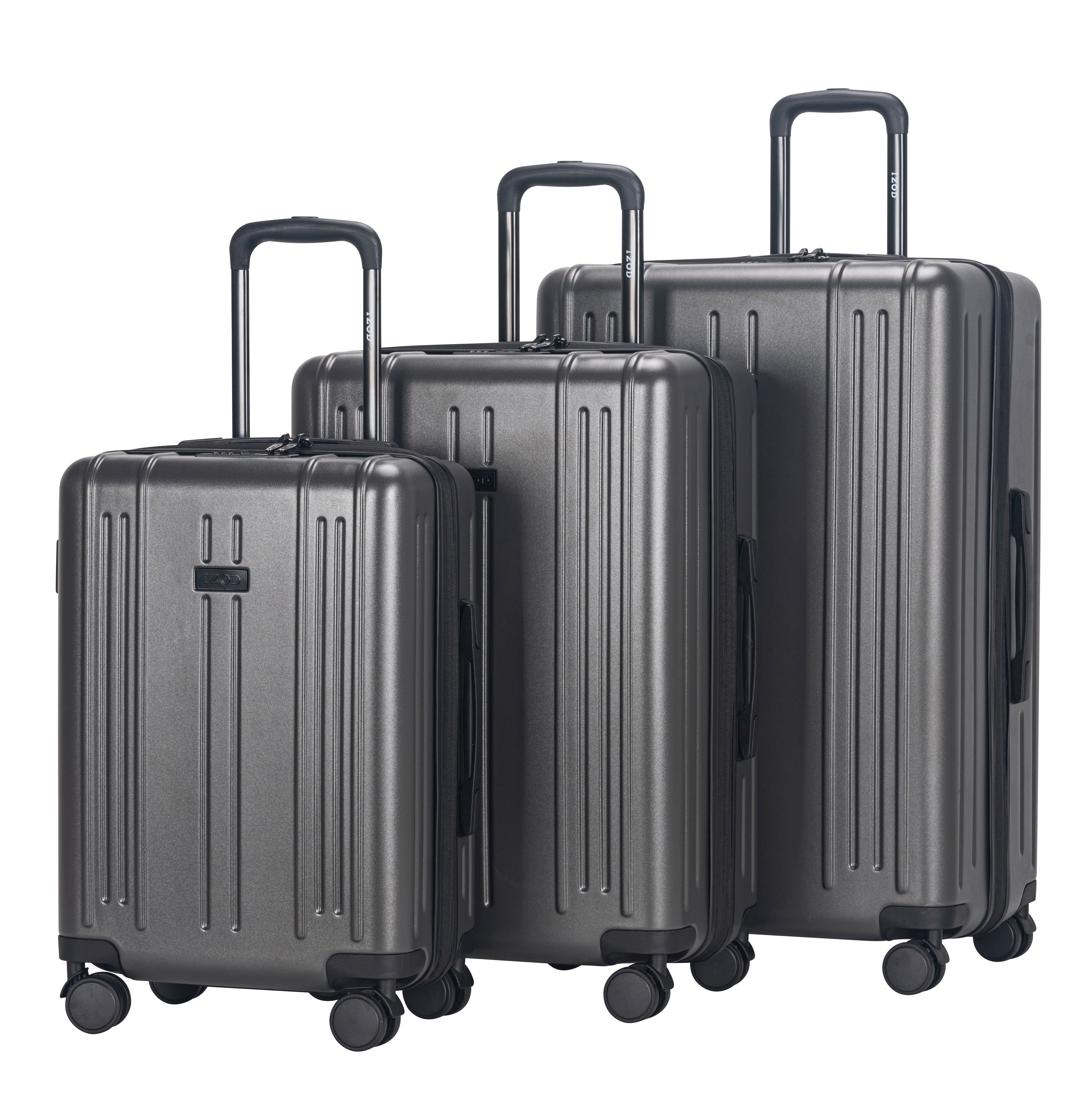 Set of three gray suitcases of different sizes on a white background