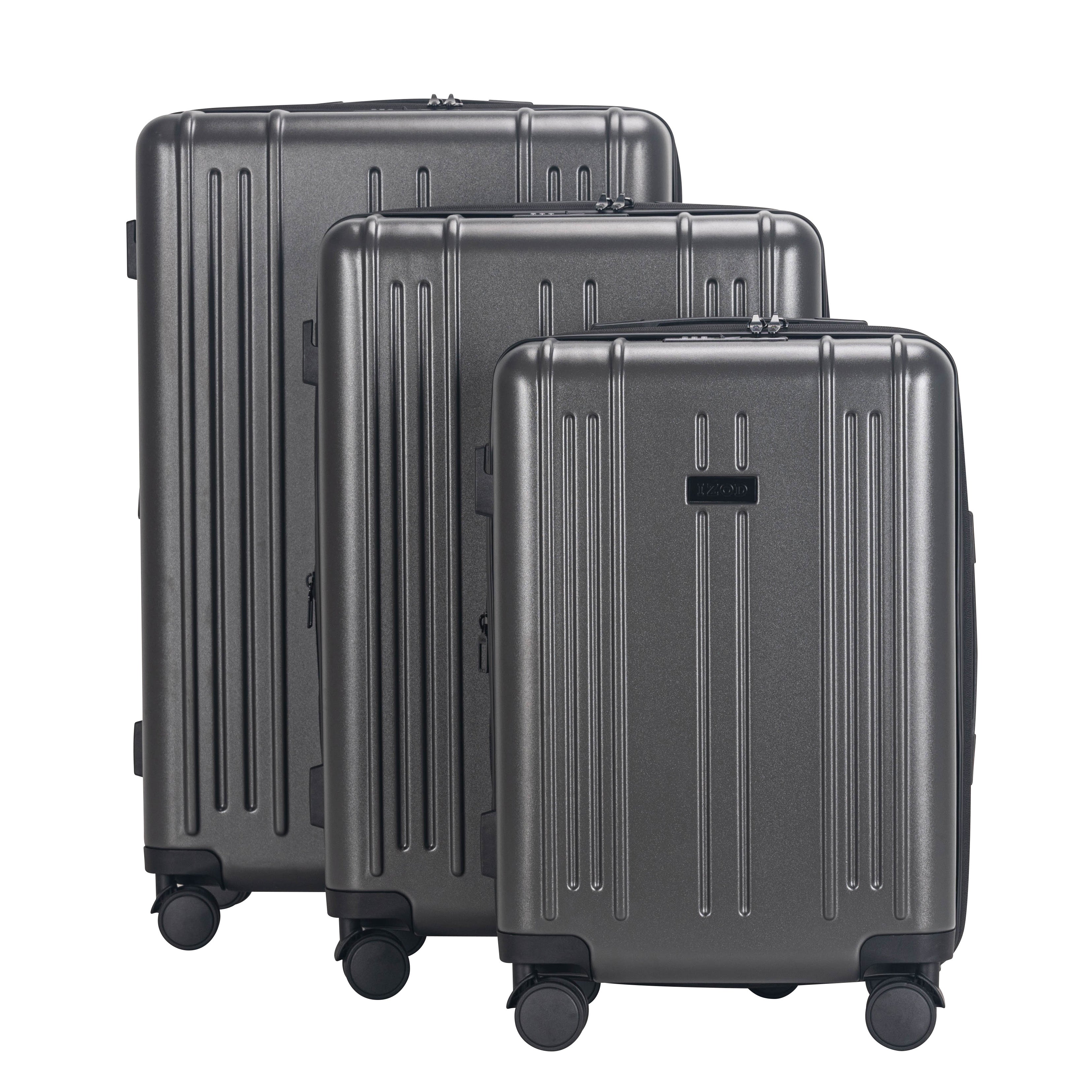 Three gray suitcases of different sizes on a white background