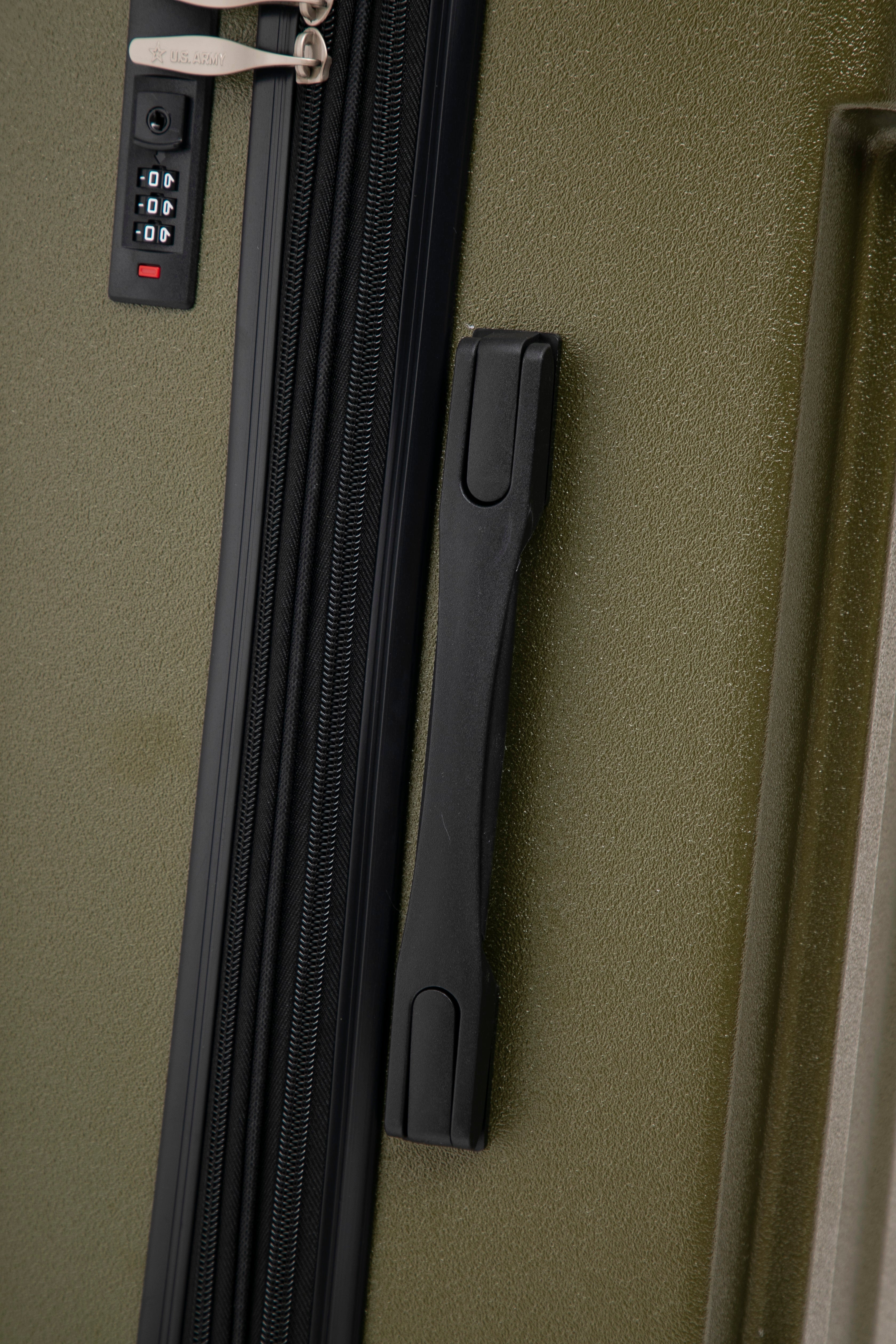 Close-up of a green suitcase with a zipper and handle
