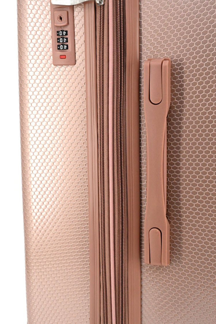 Rose gold suitcase with handle and combination lock on a white background