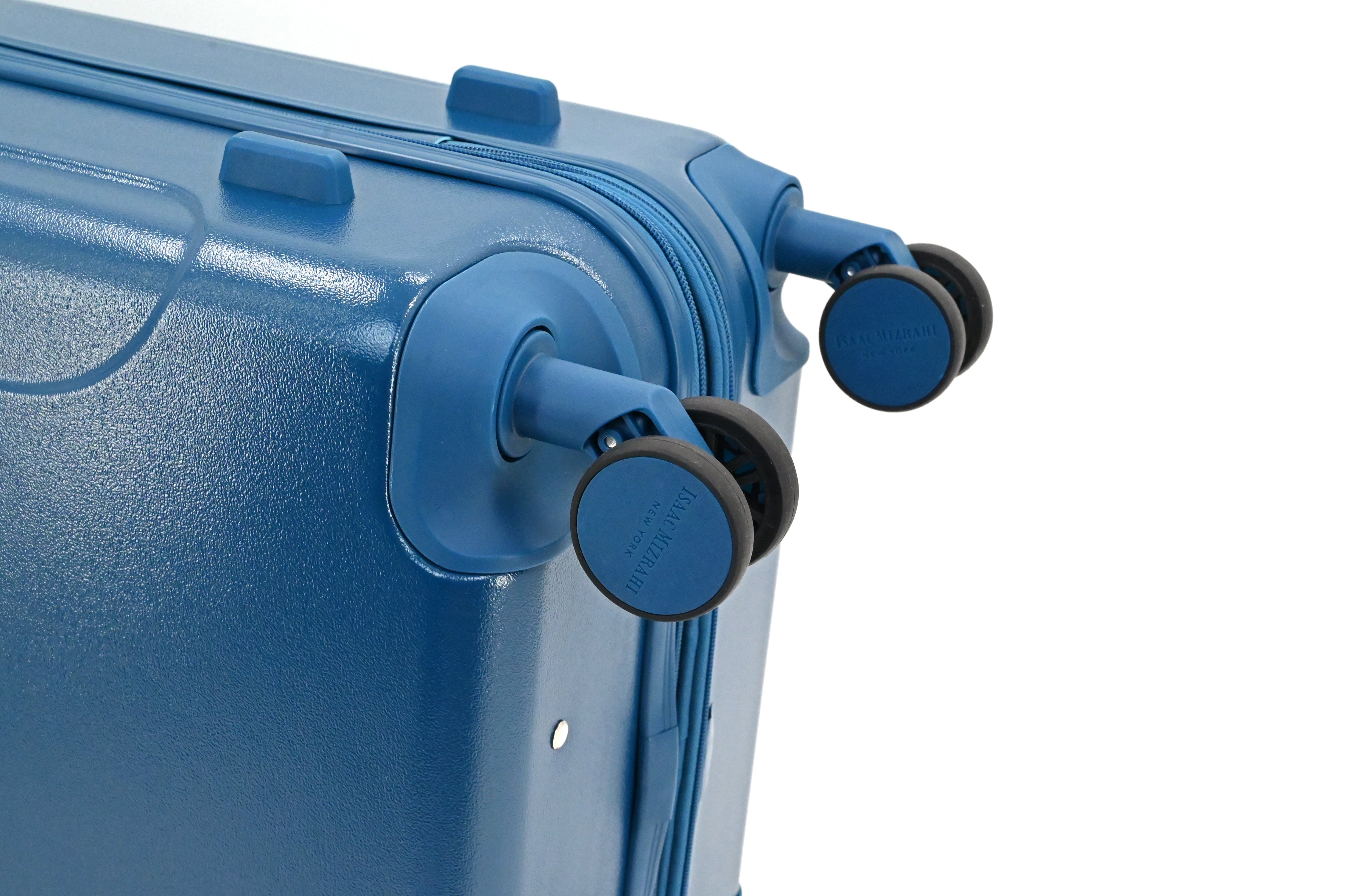 Close-up of a blue suitcase with wheels on a white background