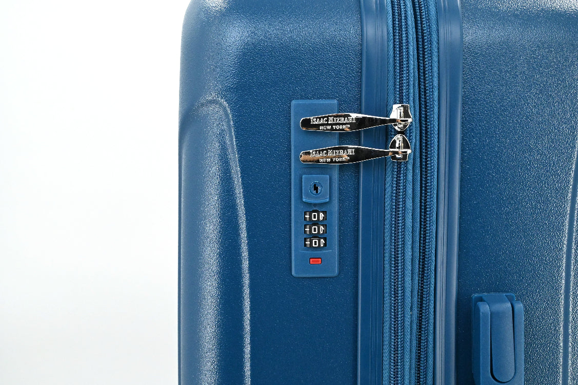 Blue suitcase with a combination lock on a white background