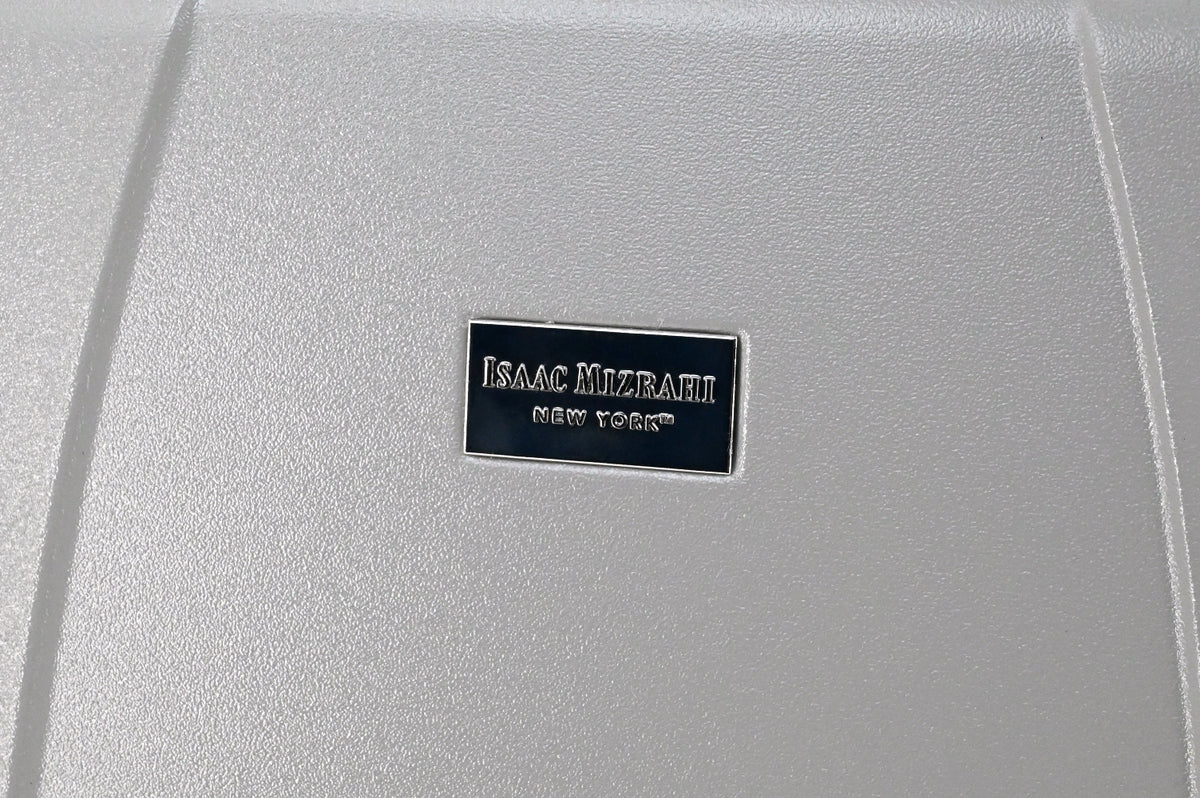 Silver textured surface with a visible Isaac Mizrahi New York label.
