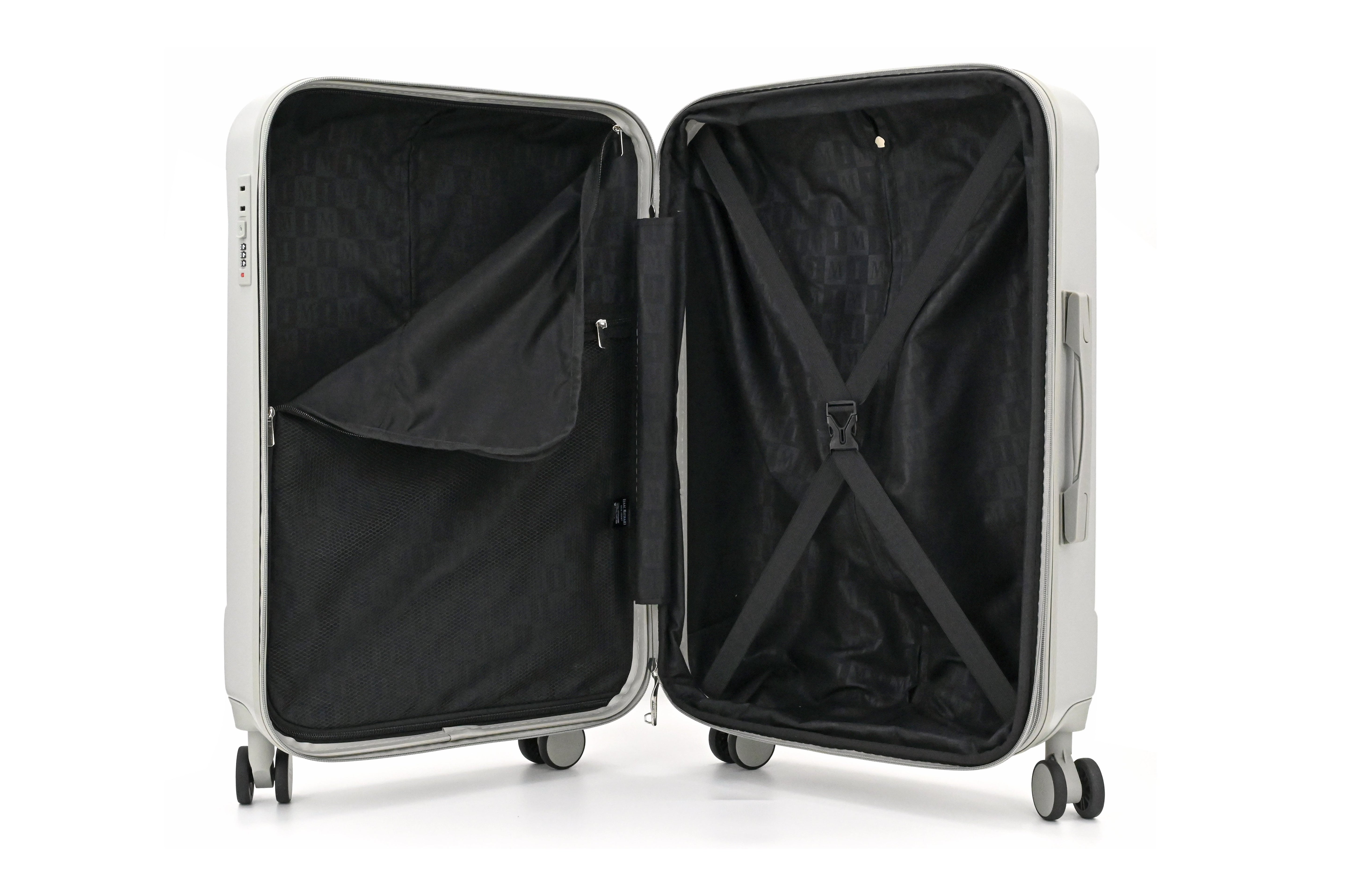 Open suitcase with black interior on a white background
