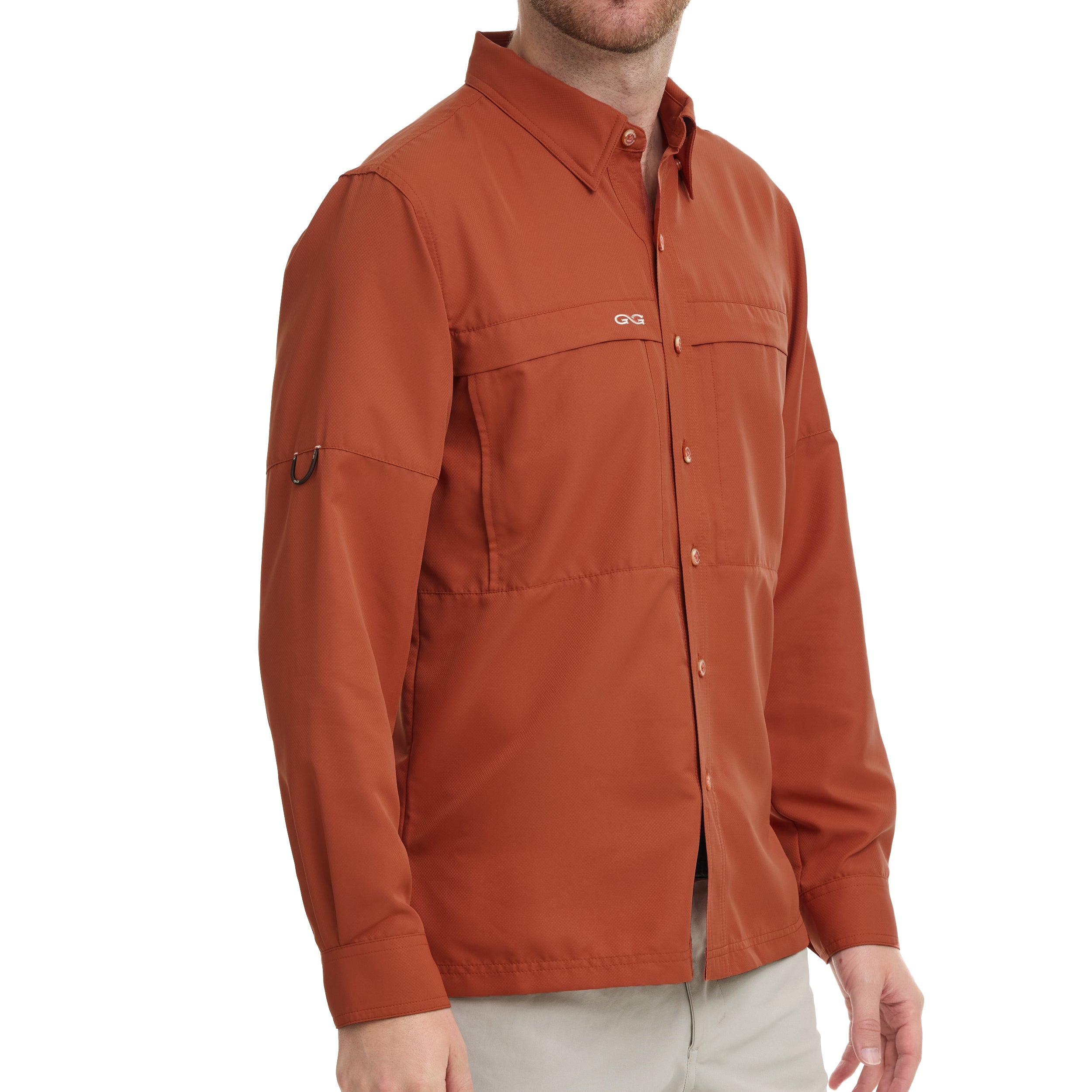 Man wearing a brown jacket with a visible brand logo on a white background