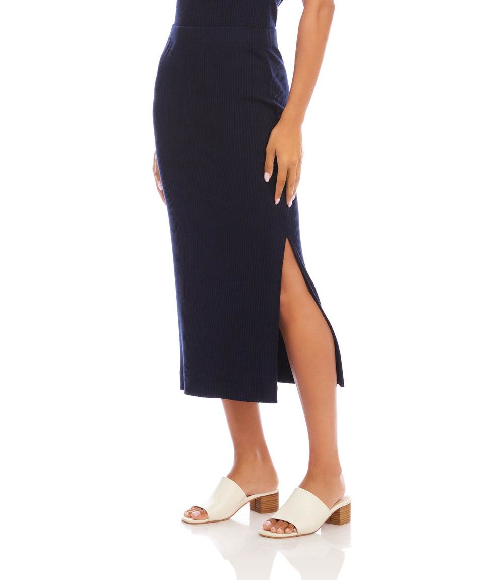 Navy blue pencil skirt with a high slit worn by a person on a white background