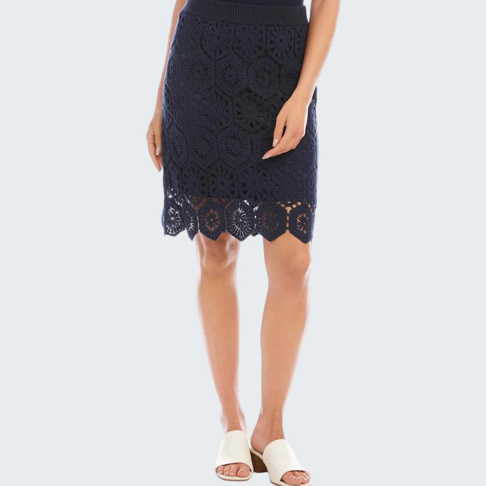 Navy lace skirt worn by a person on a white background