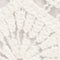 A close-up of a white lace fabric with a delicate floral pattern.