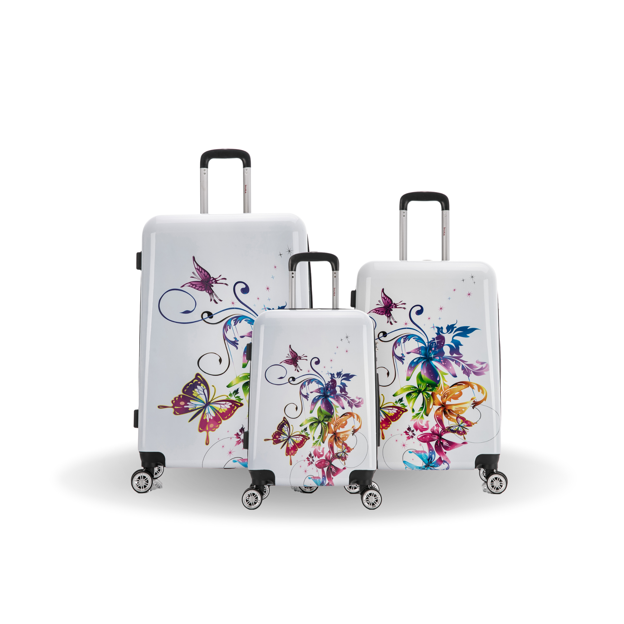 Set of three suitcases with colorful butterfly designs on a white background