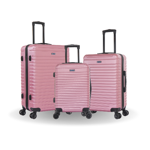Set of three pink suitcases with black handles and wheels on a white background