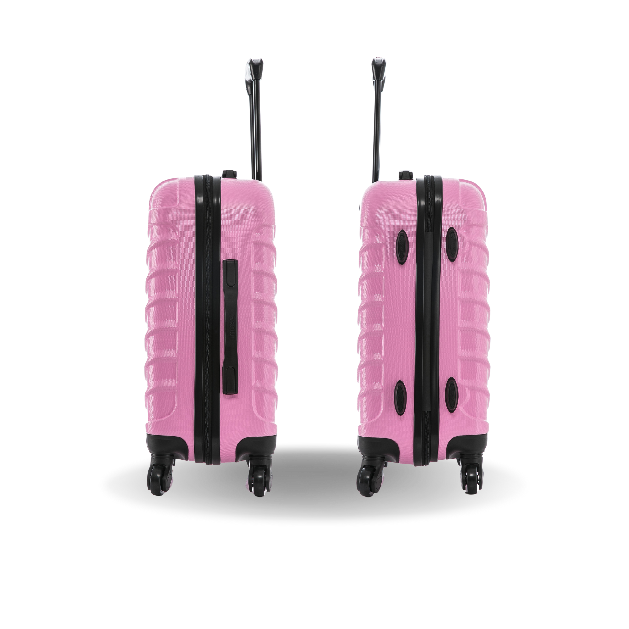 Two pink suitcases with black zippers and wheels on a white background