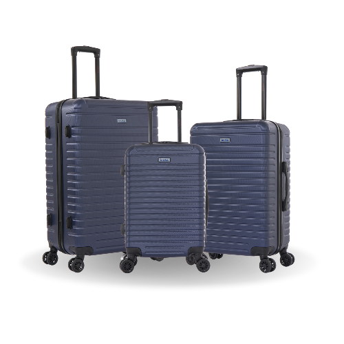 Set of three blue suitcases of different sizes on a white background