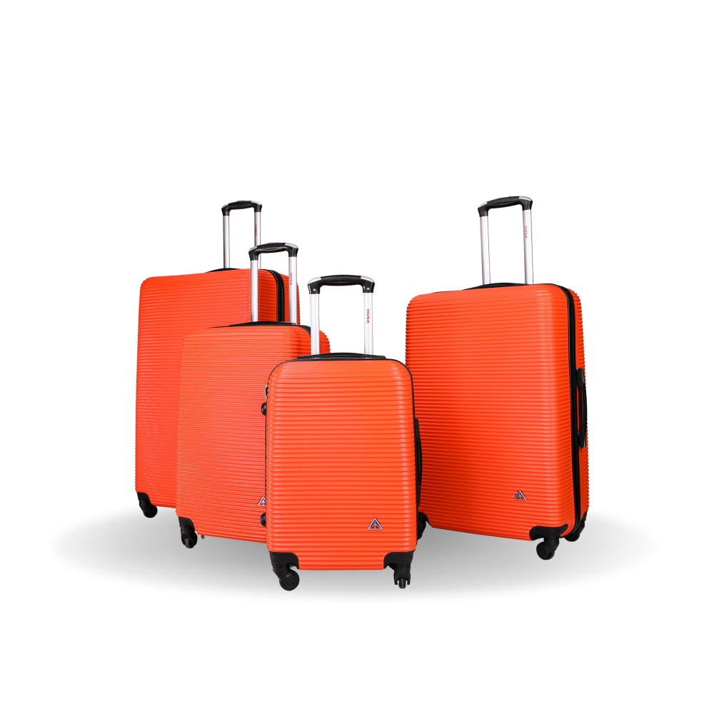 Set of four orange suitcases of different sizes on a white background