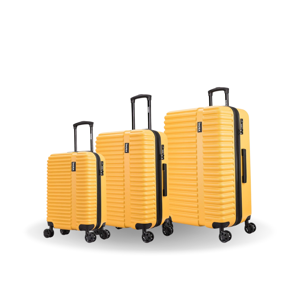 Set of three yellow suitcases with black handles and wheels on a white background