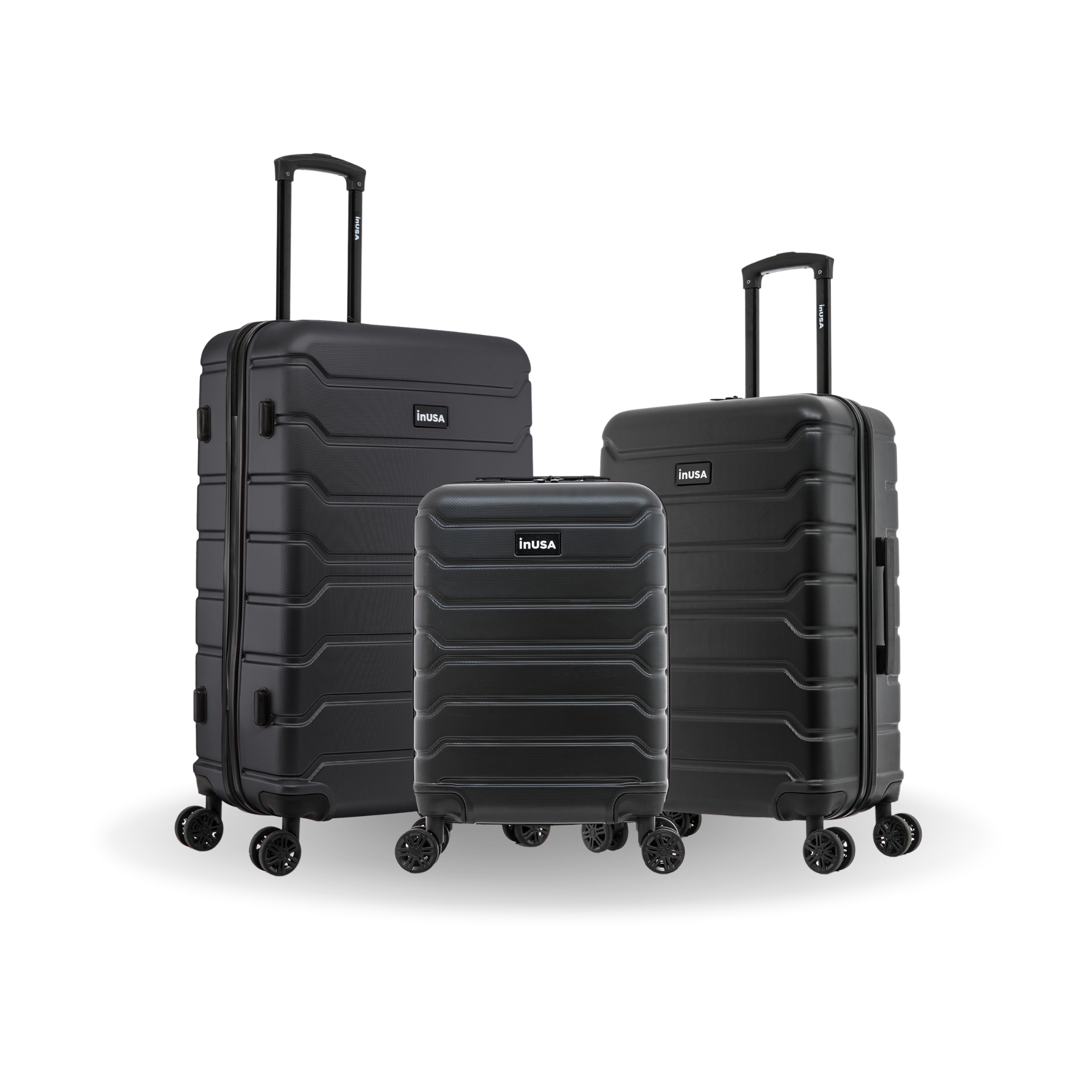 Three black suitcases of different sizes with 'InUSA' branding on a white background