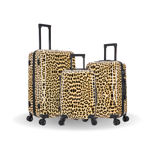 Set of three leopard print suitcases on a white background
