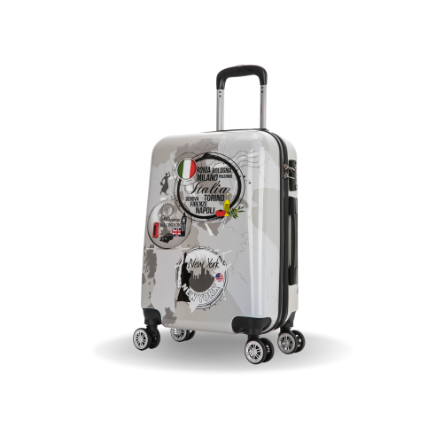 White suitcase with travel-themed stickers on a white background