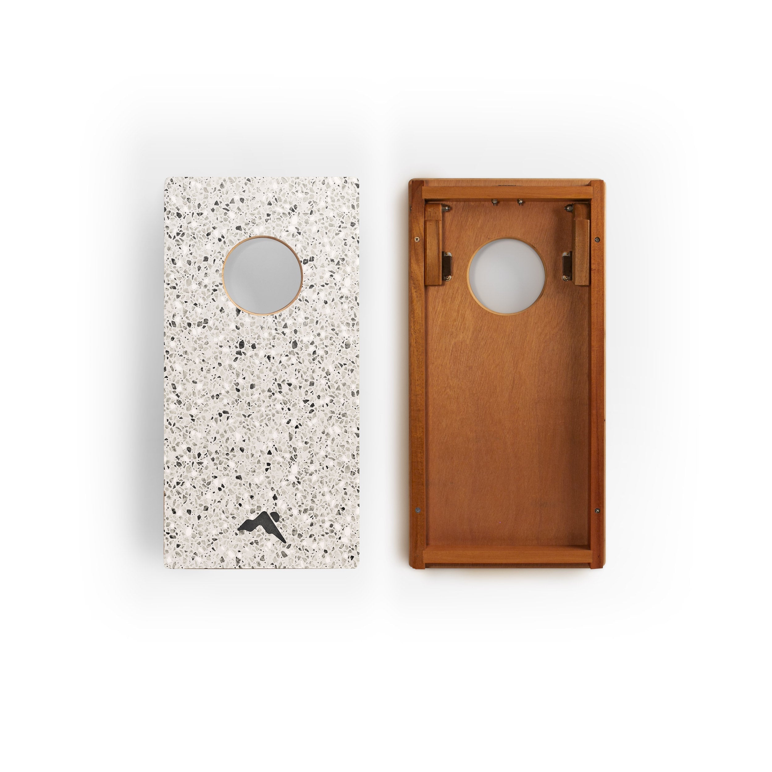 Two phone cases, one speckled and one wooden, on a white background