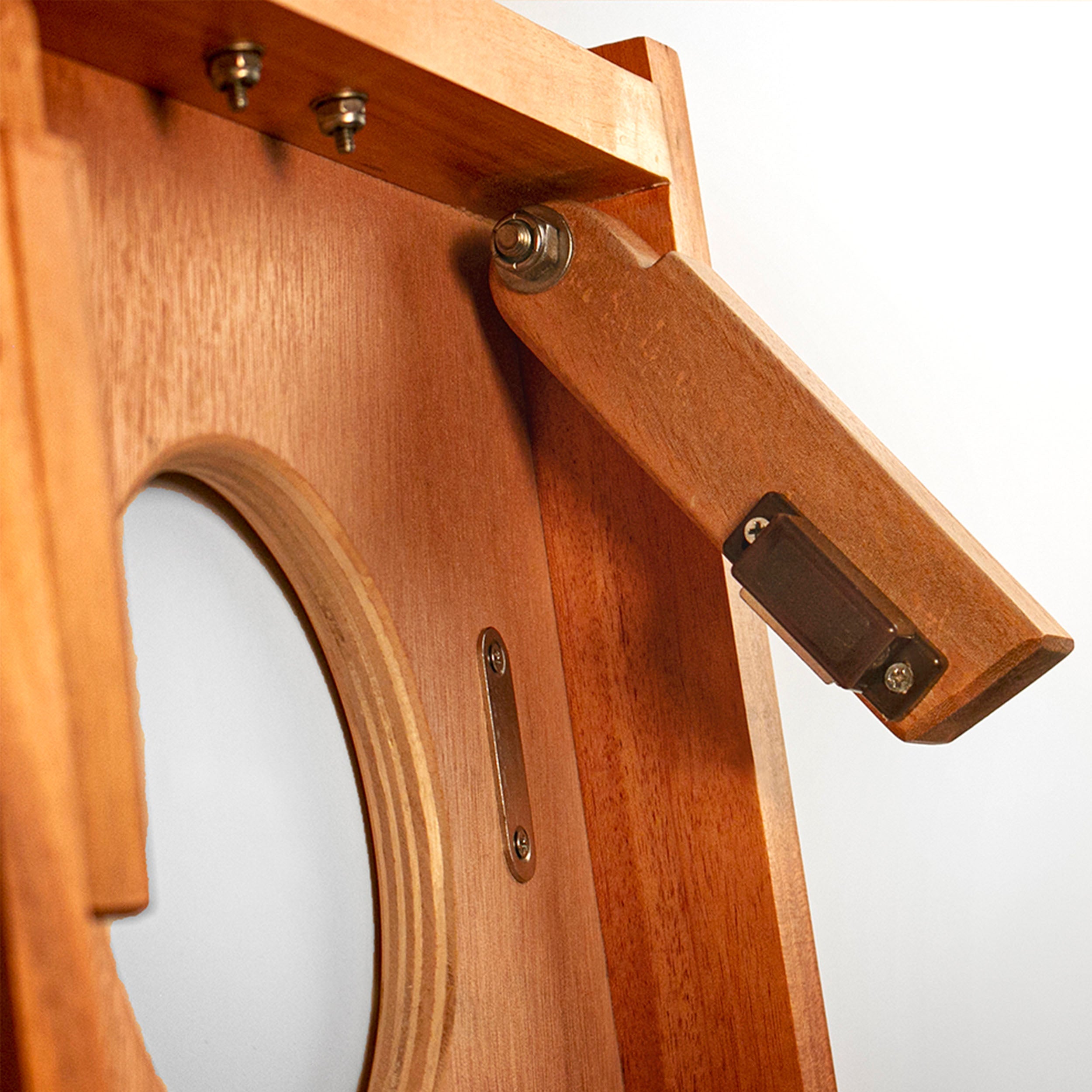 Wooden bracket with metal components on a white background
