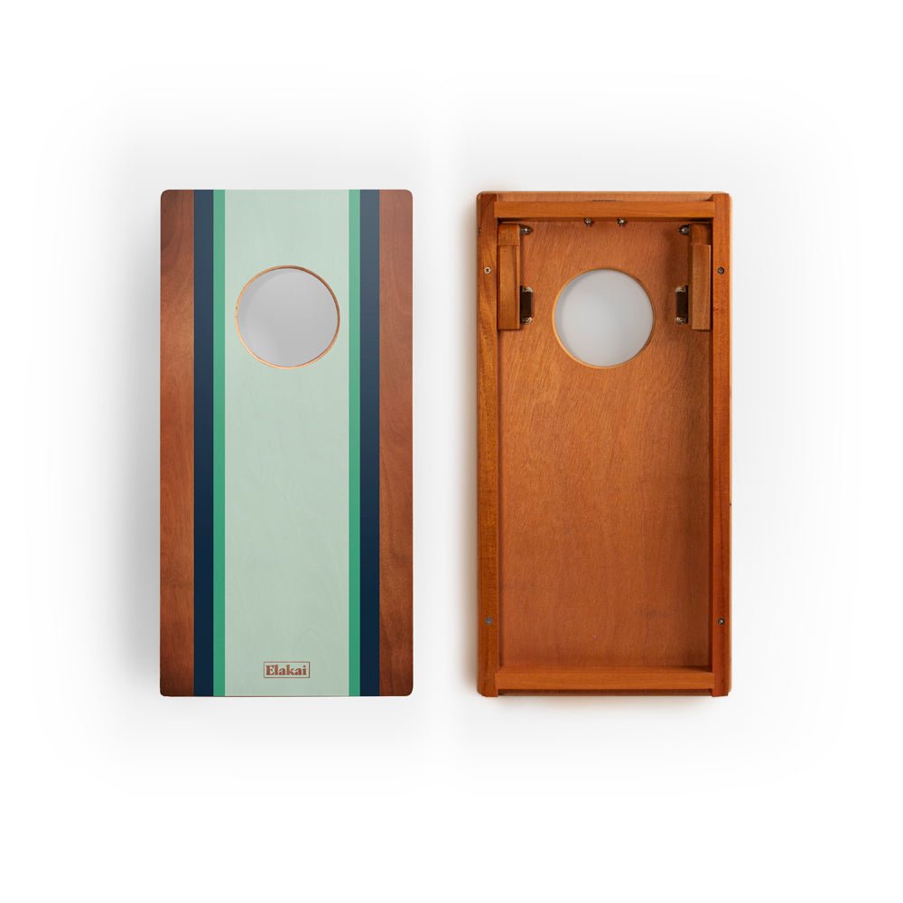 Two wooden boards with a green and brown design on a white background