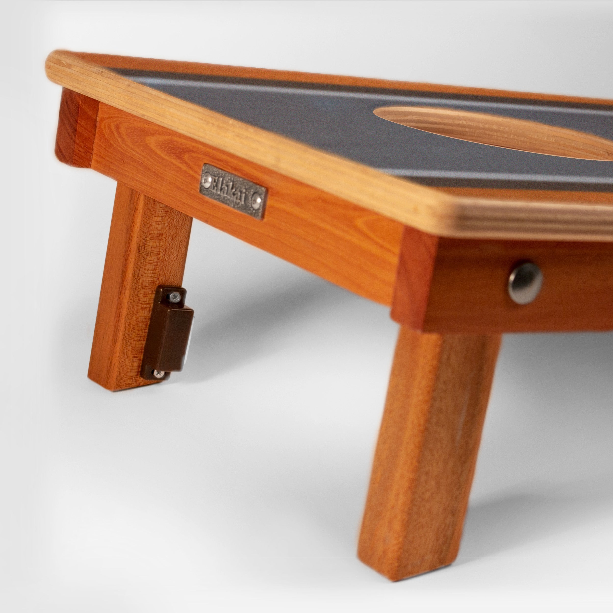 Wooden pool table with a visible brand logo on a white background