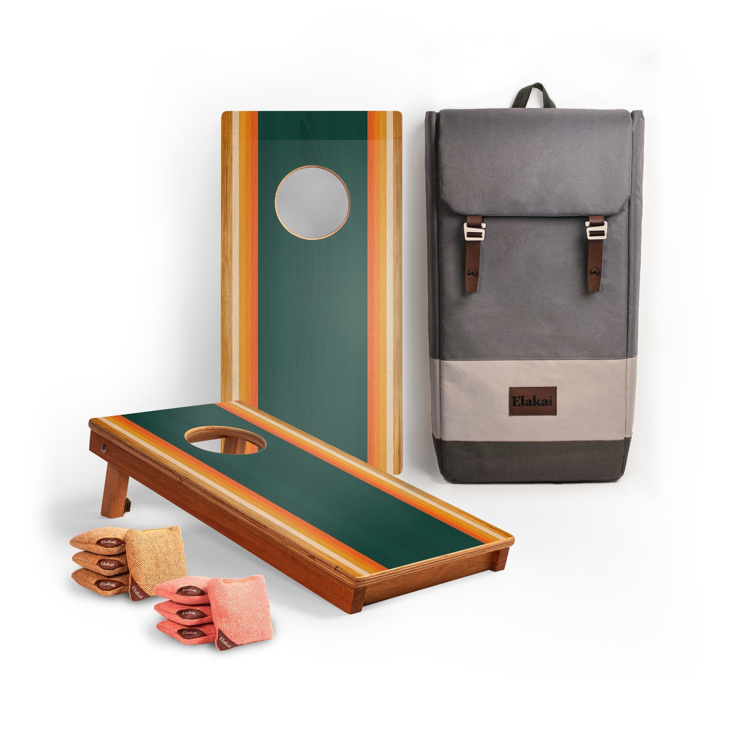 Cornhole boards with green and brown design, a gray backpack, and bags on a white background