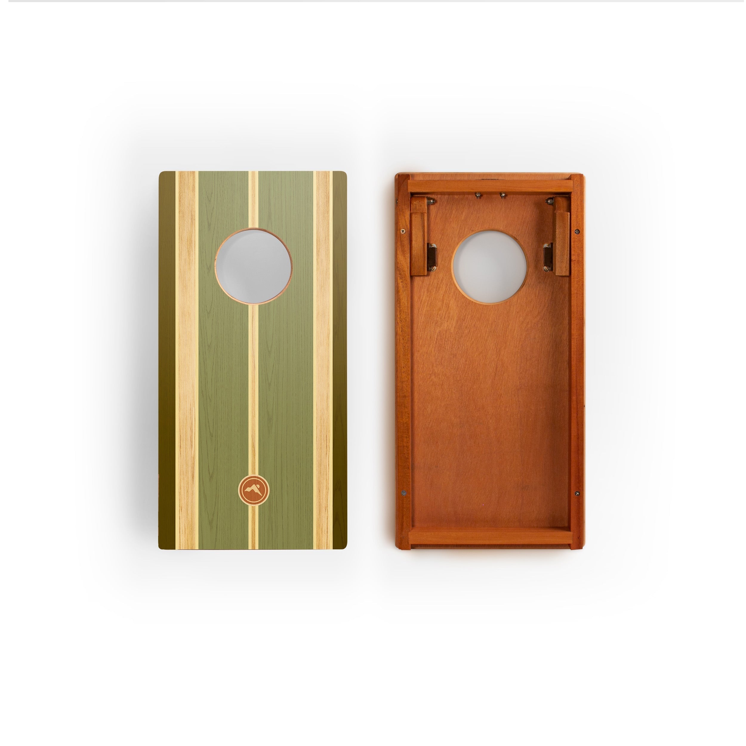 Two wooden cornhole boards shown side by side on a white background, one displaying the green and tan striped front with a circular hole, and the other showing the warm brown wood back with a circular cutout.