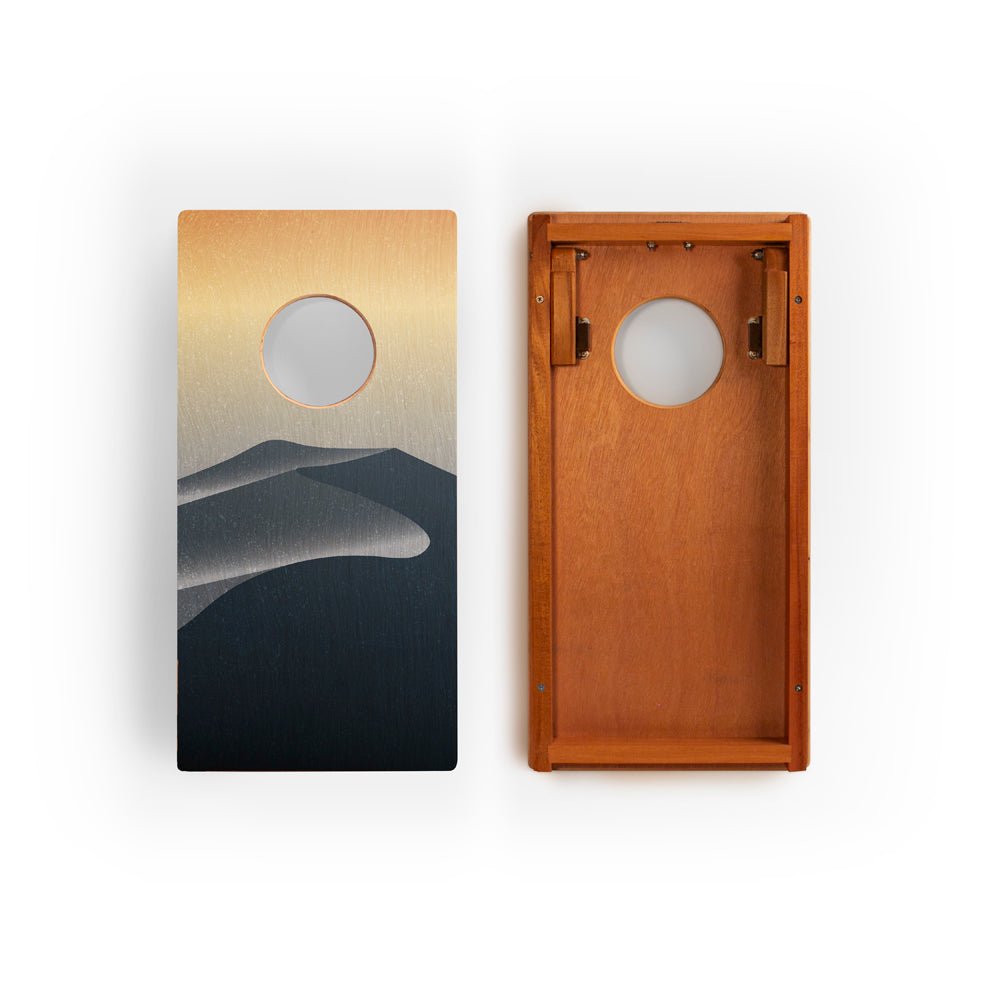 Two wooden panels with artistic designs on a white background