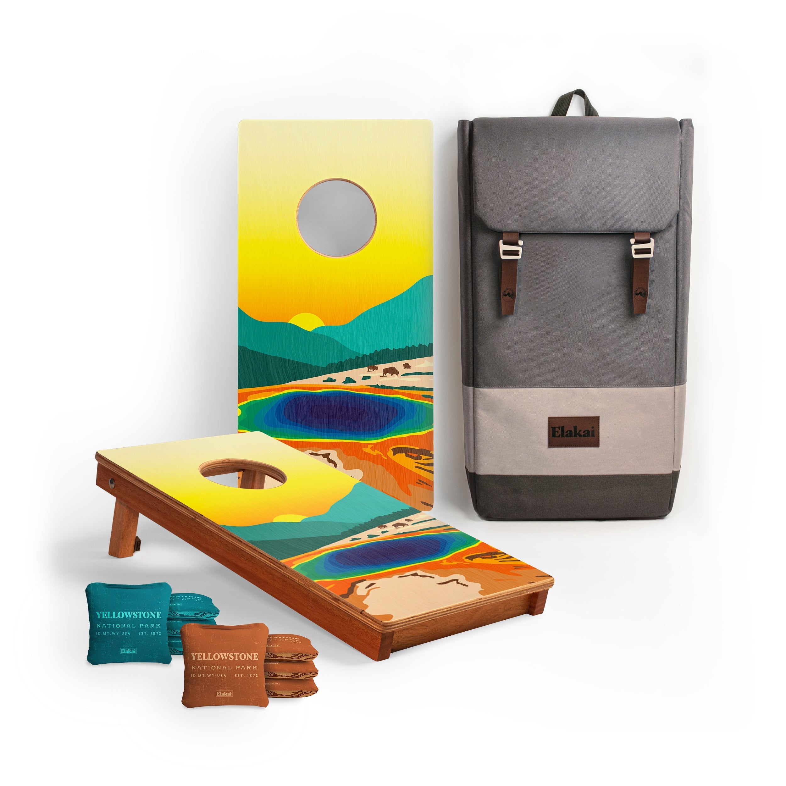 Cornhole boards with colorful design, bean bags, and a gray backpack on a white background