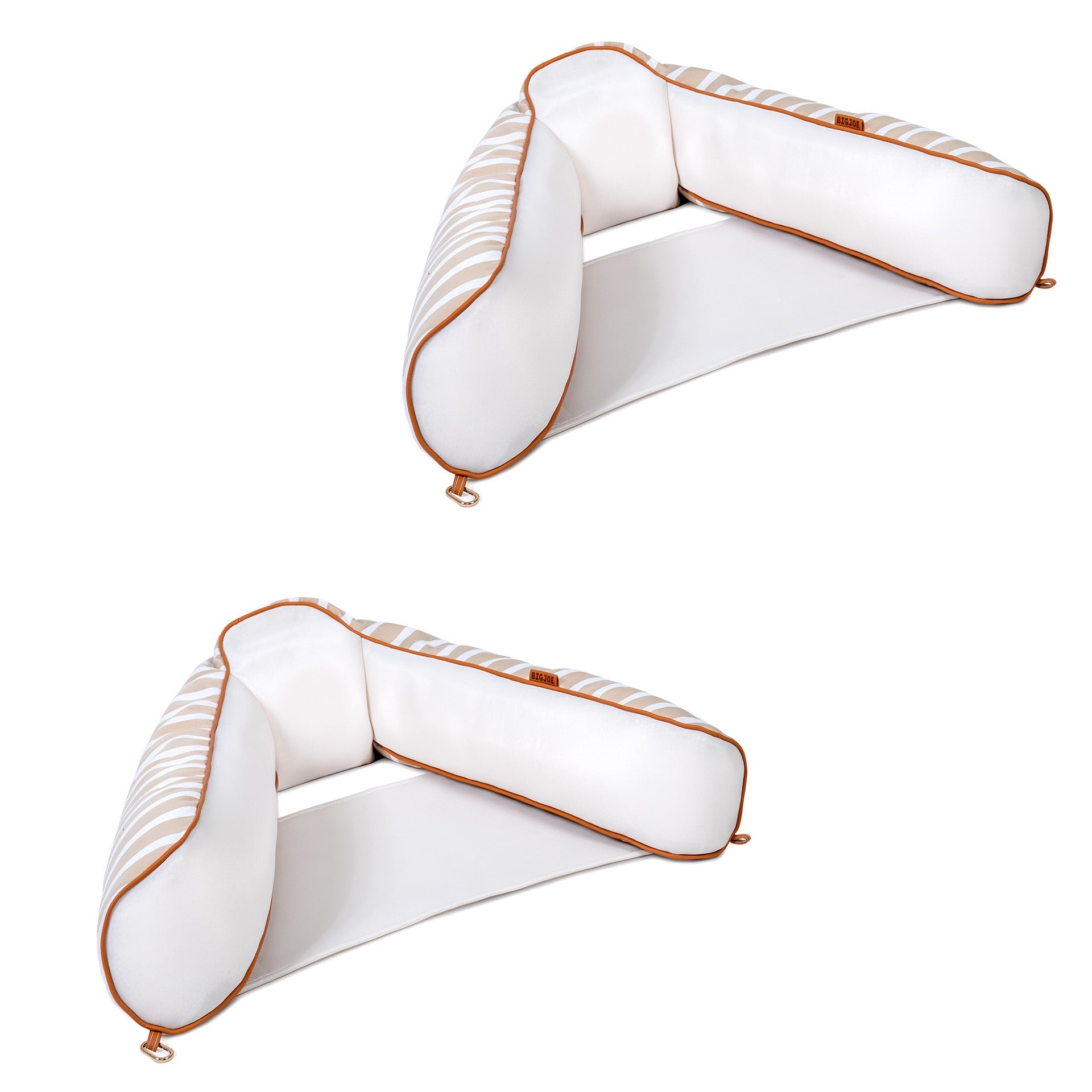 Two white pillows with gold trim on a white background
