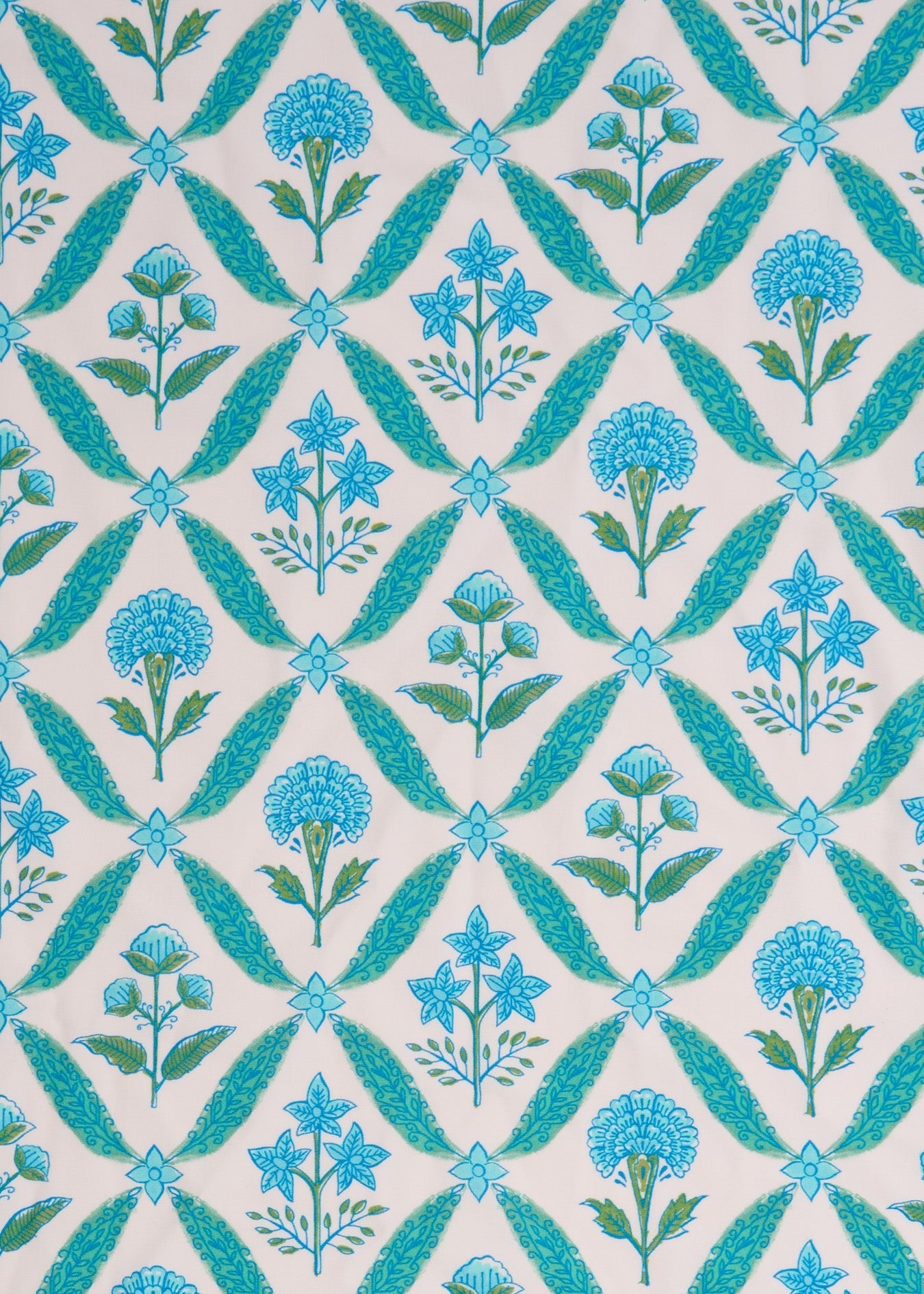 Patterned fabric with blue floral design on a white background