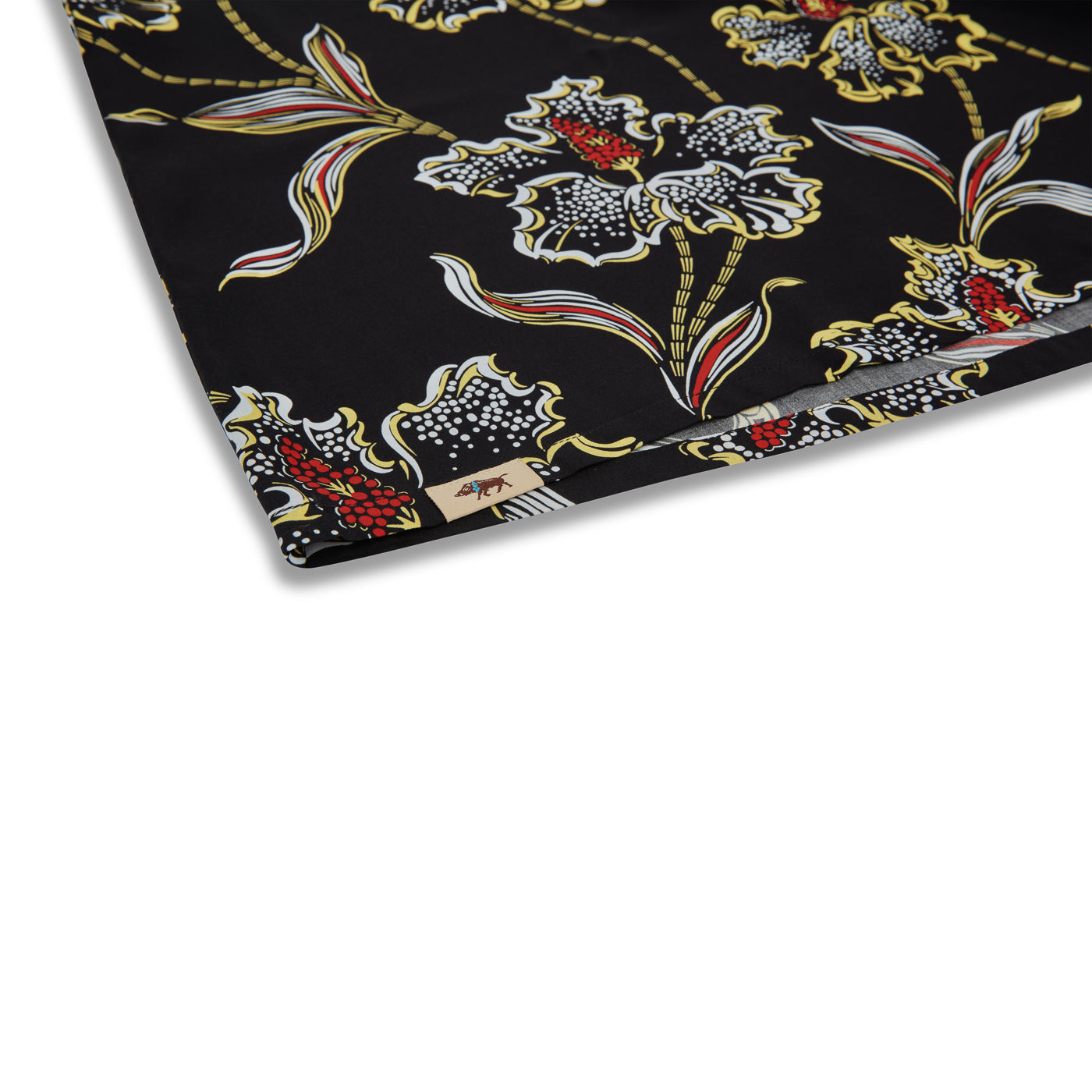 Decorative paper with floral and leaf patterns on a black background