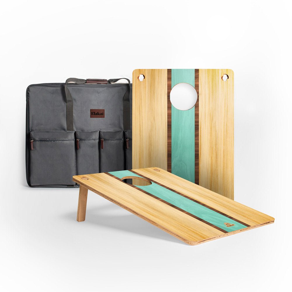 Wooden cutting board with green accent and gray carrying bag on a white background