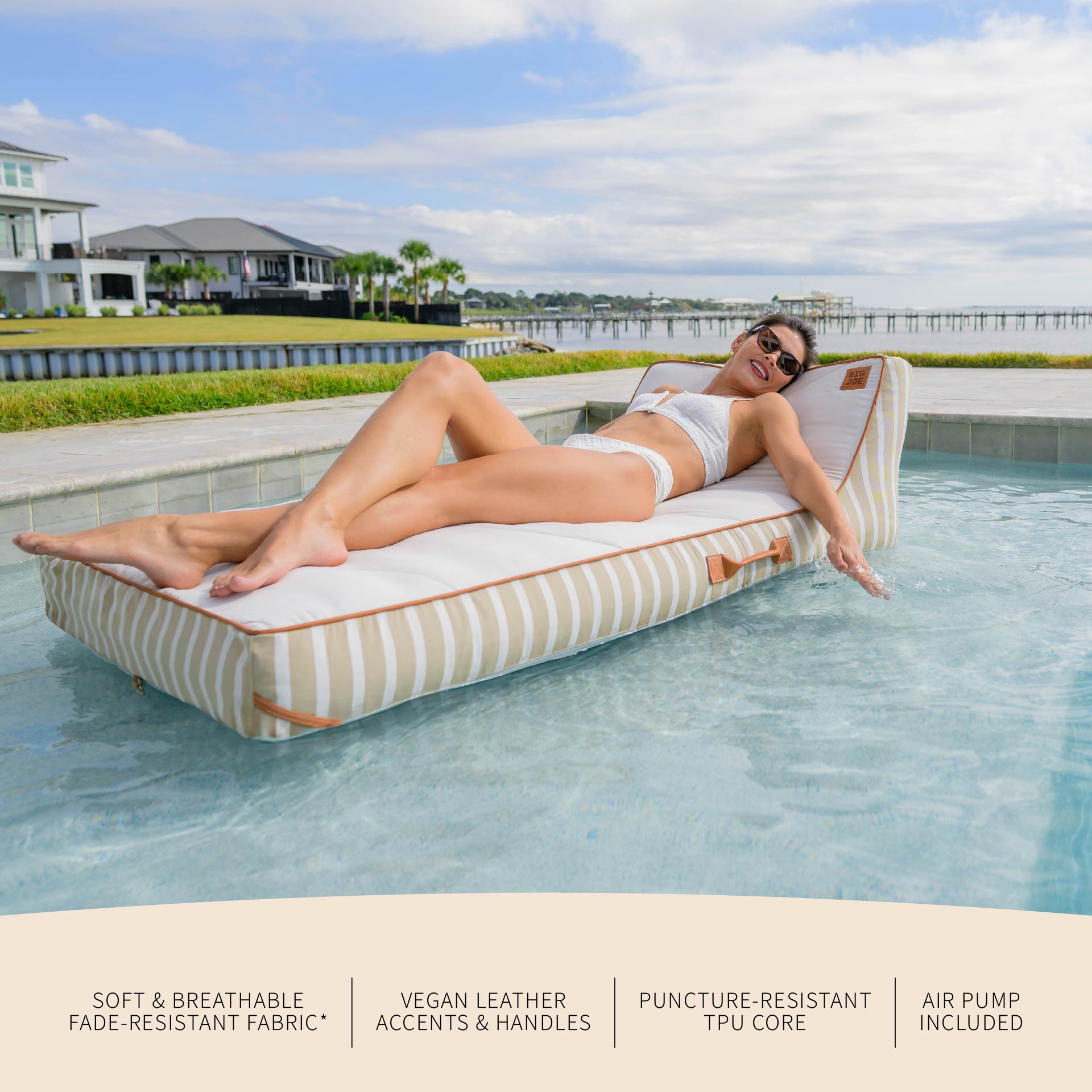 Woman lounging on a striped pool float in a pool with text detailing features.