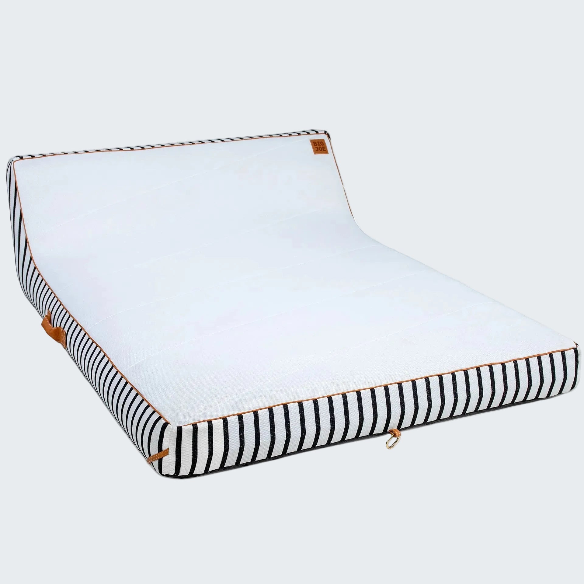 White pet bed with black and white striped sides on a white background