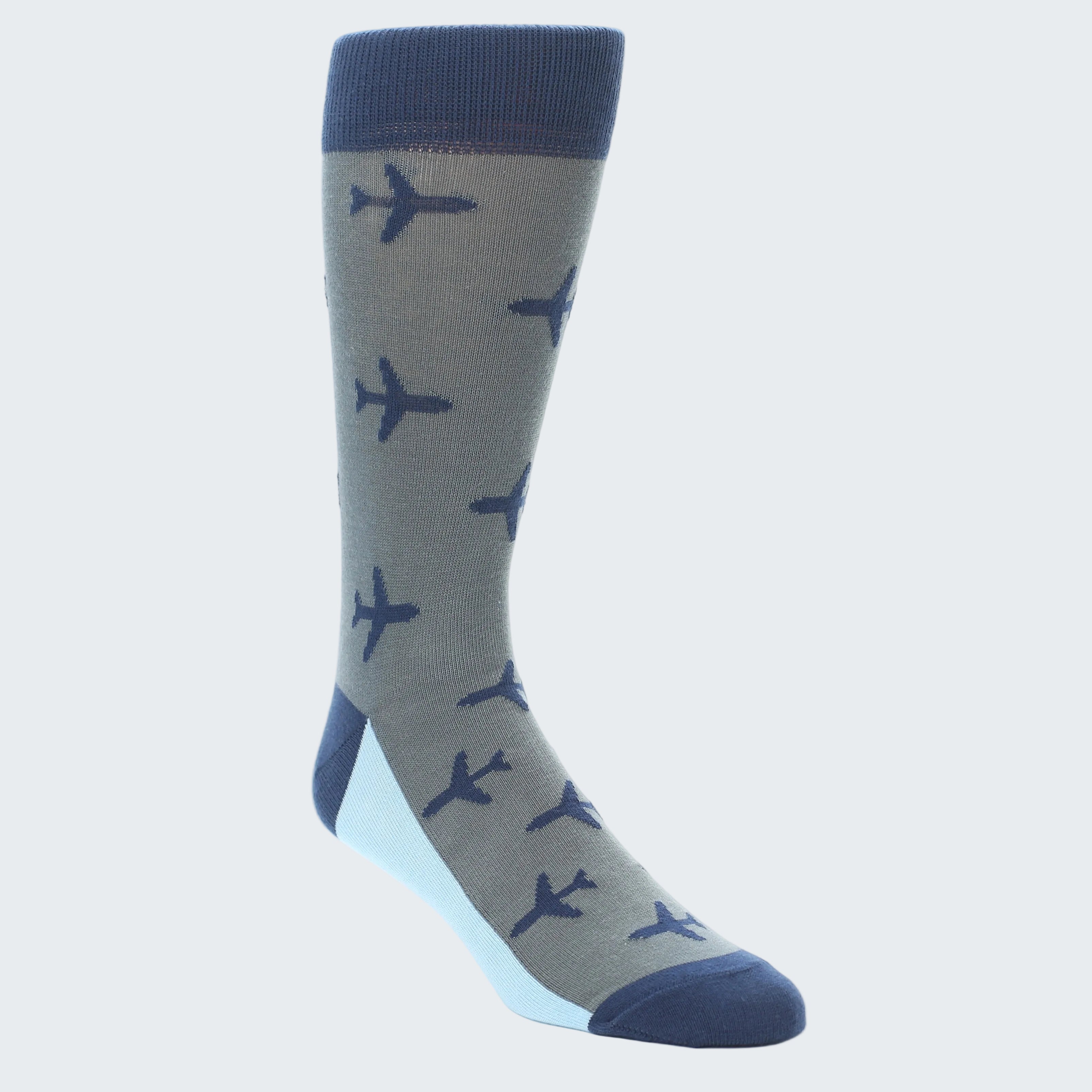 A single gray crew sock with a pattern of small dark blue airplanes, featuring a navy blue cuff, heel, and toe, and a light blue side panel, shown on a white background.