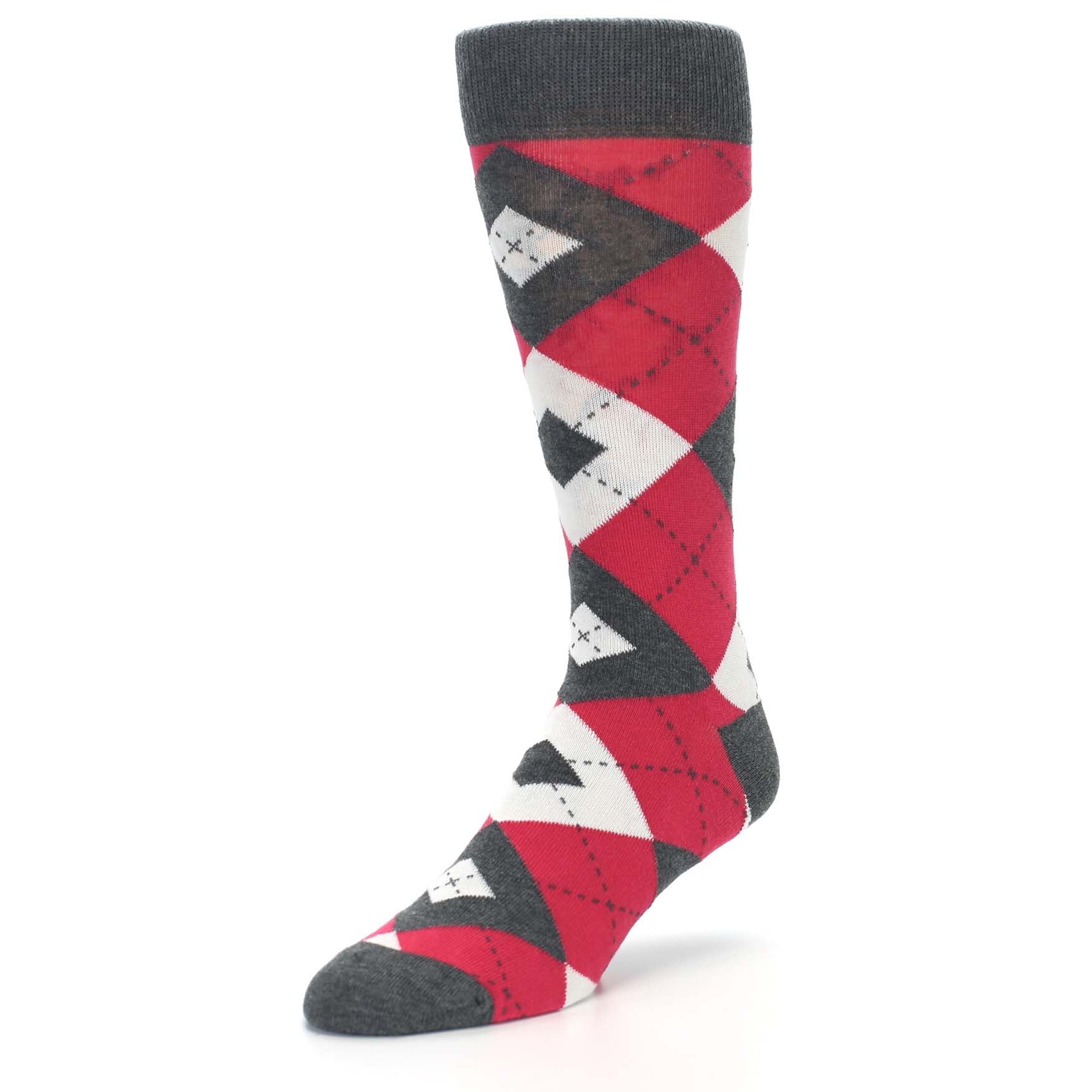 Red, black, and white argyle patterned sock on a white background