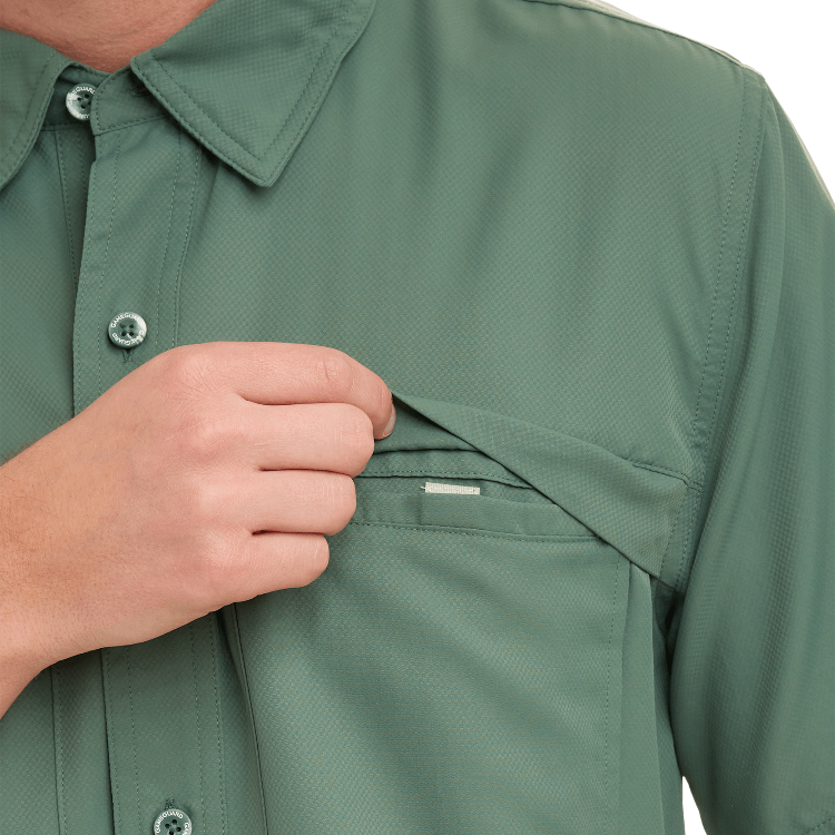 Green shirt with a hand opening a pocket on a white background