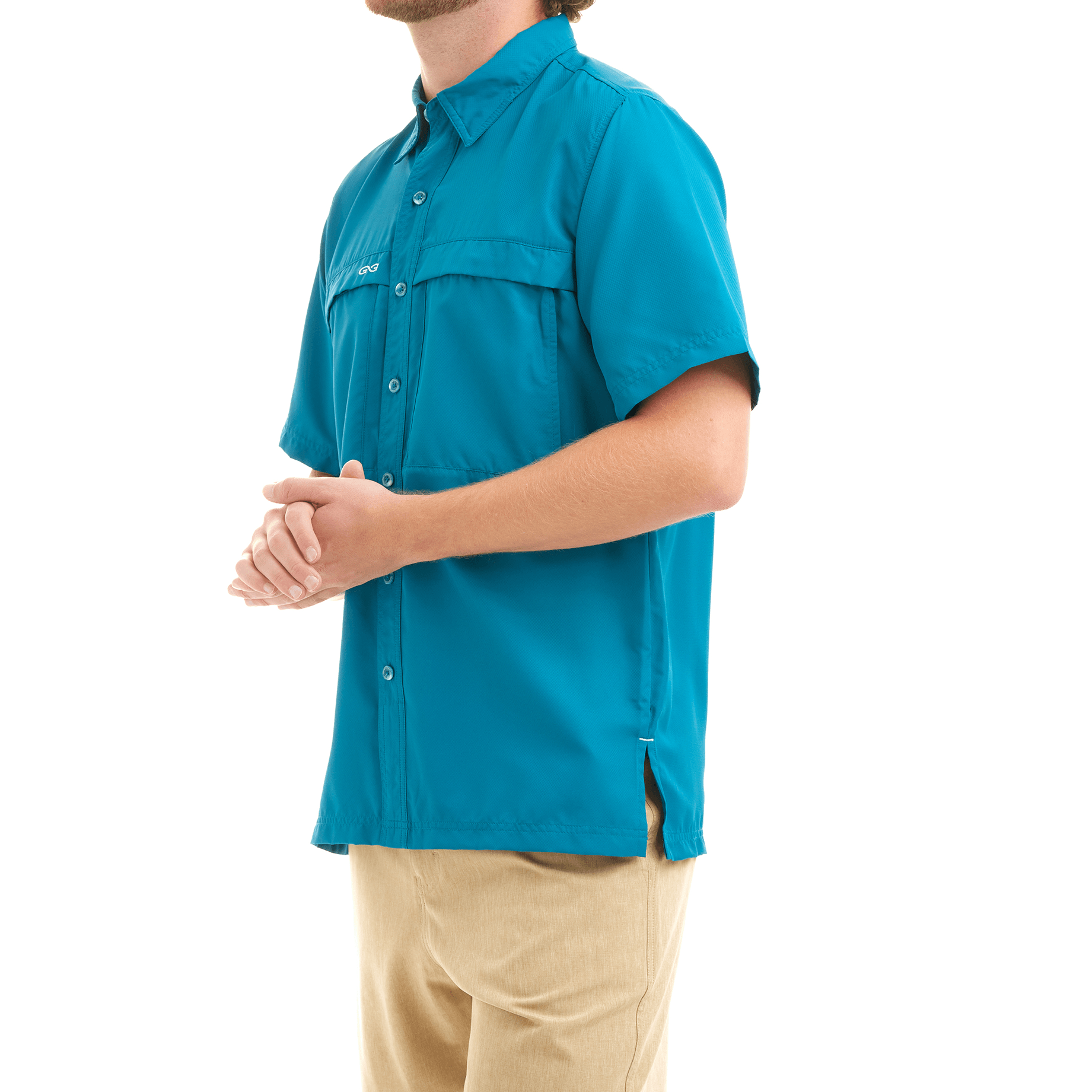 Person wearing a blue shirt with a brand logo on a white background