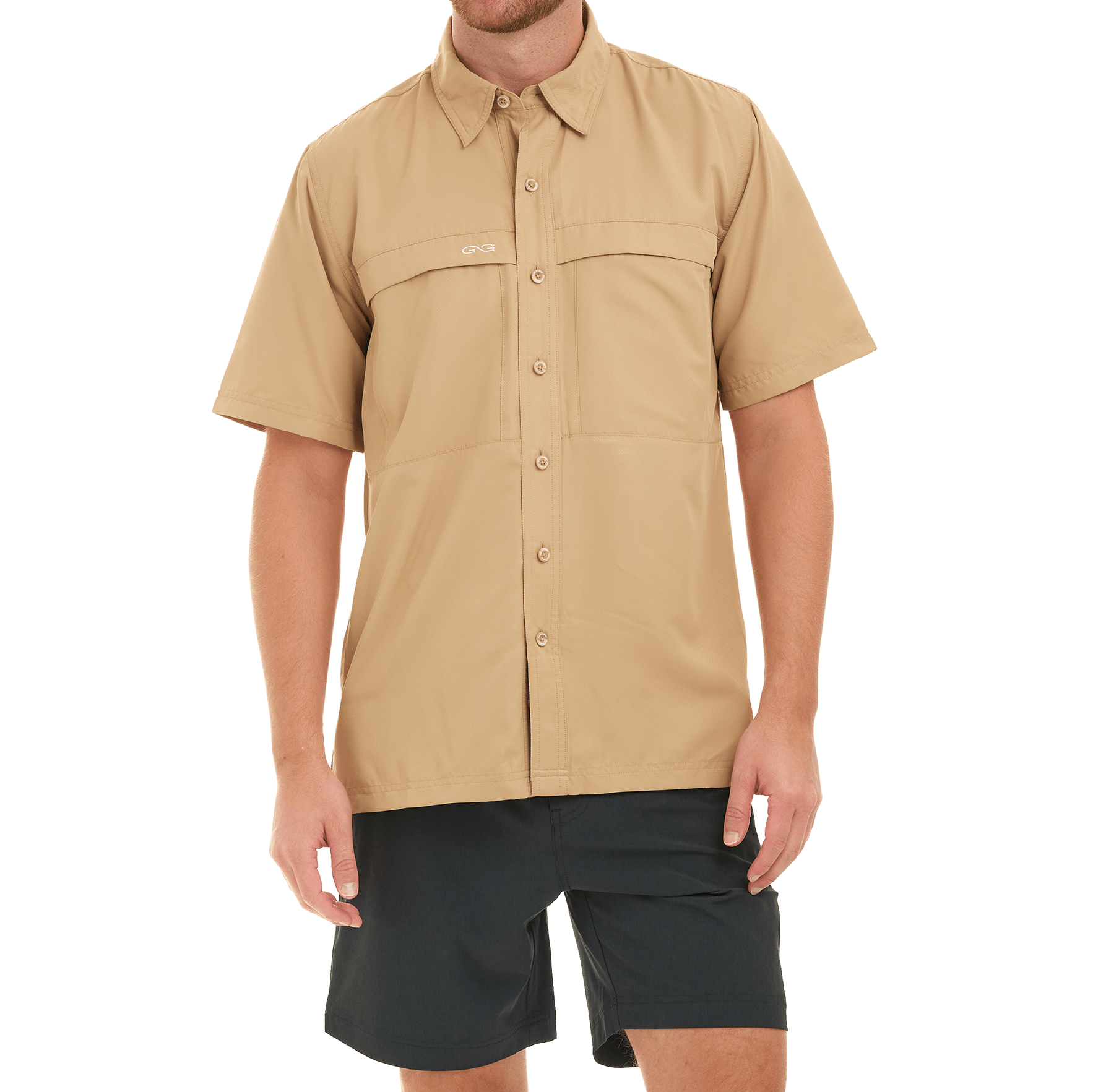 Man wearing a beige short-sleeve shirt with button details on a white background