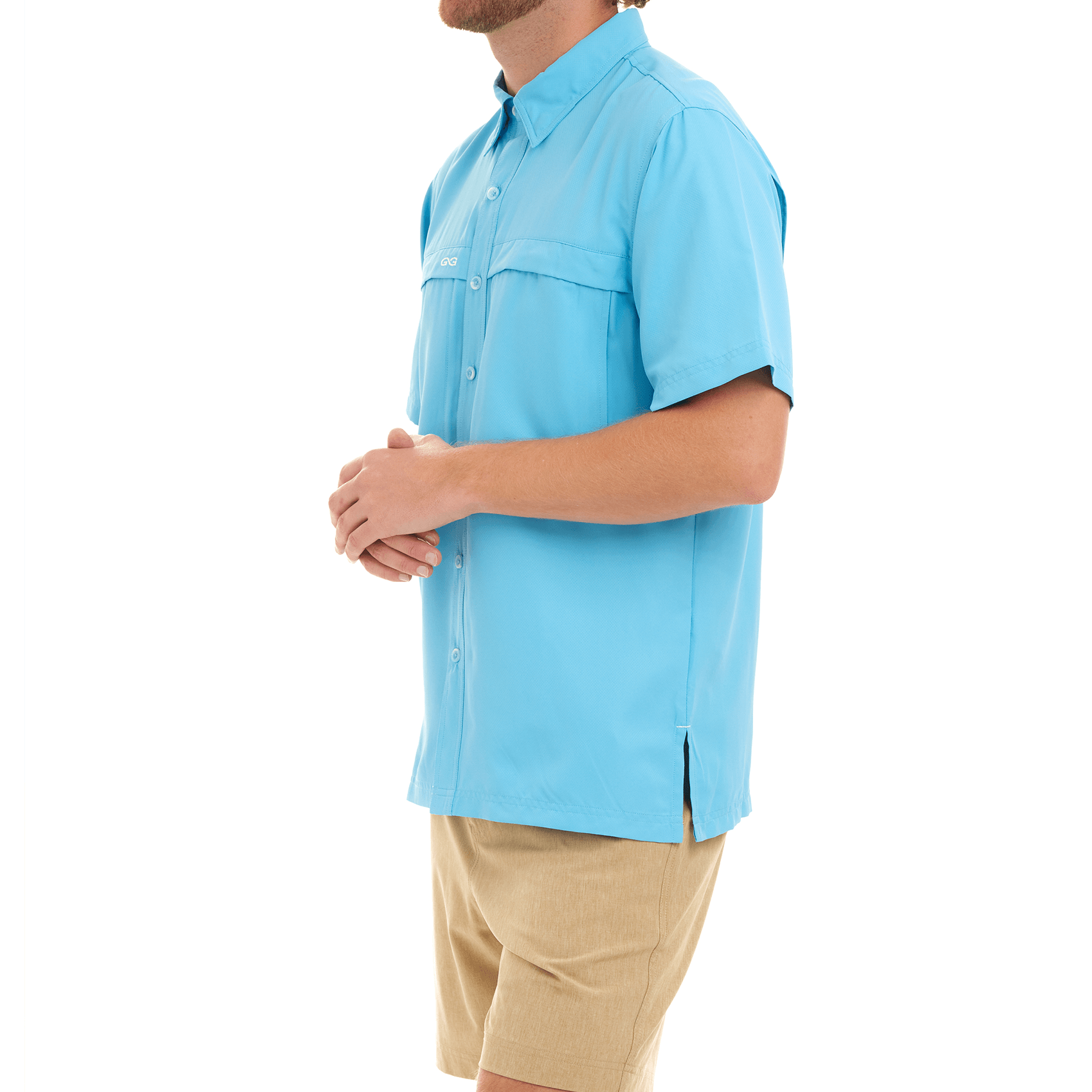 Person wearing a light blue shirt with short sleeves on a white background