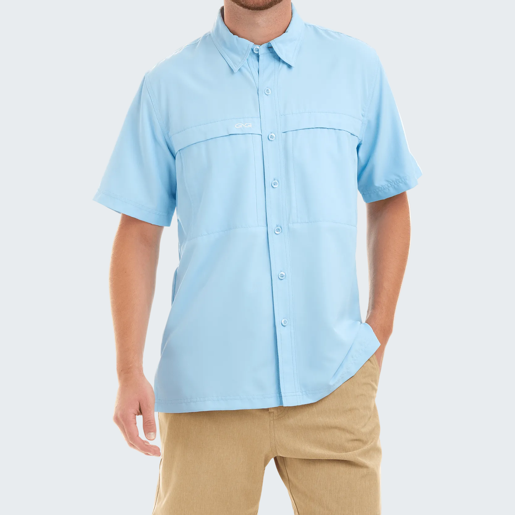 Light blue short-sleeve shirt worn by a person on a white background