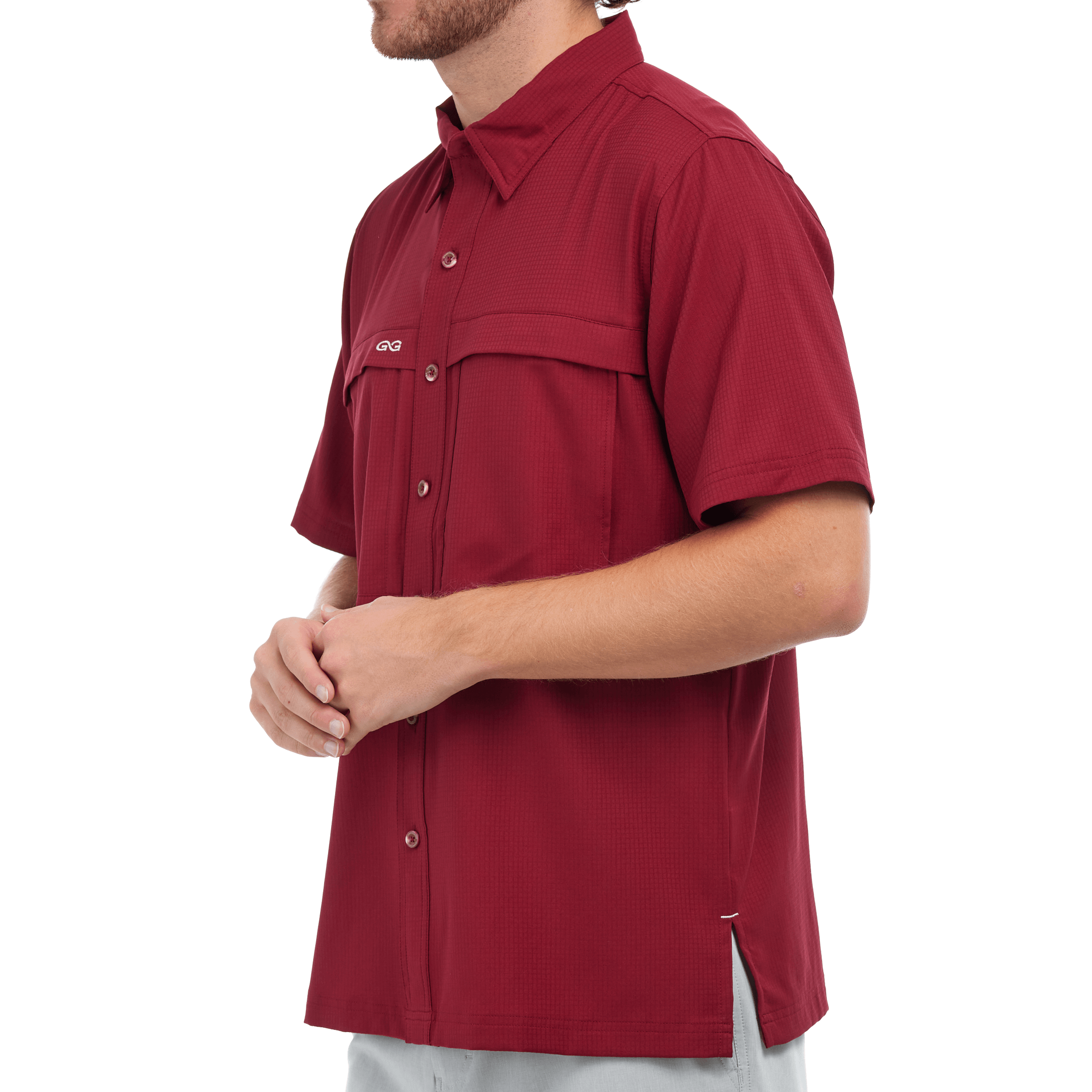 Red short-sleeve shirt worn by a person on a white background