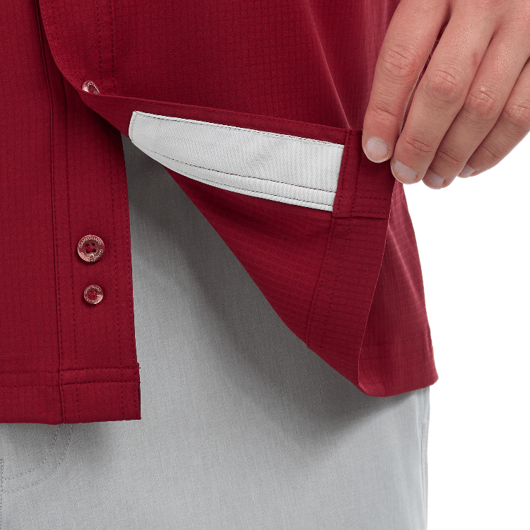 Red jacket with a white lining on a neutral background